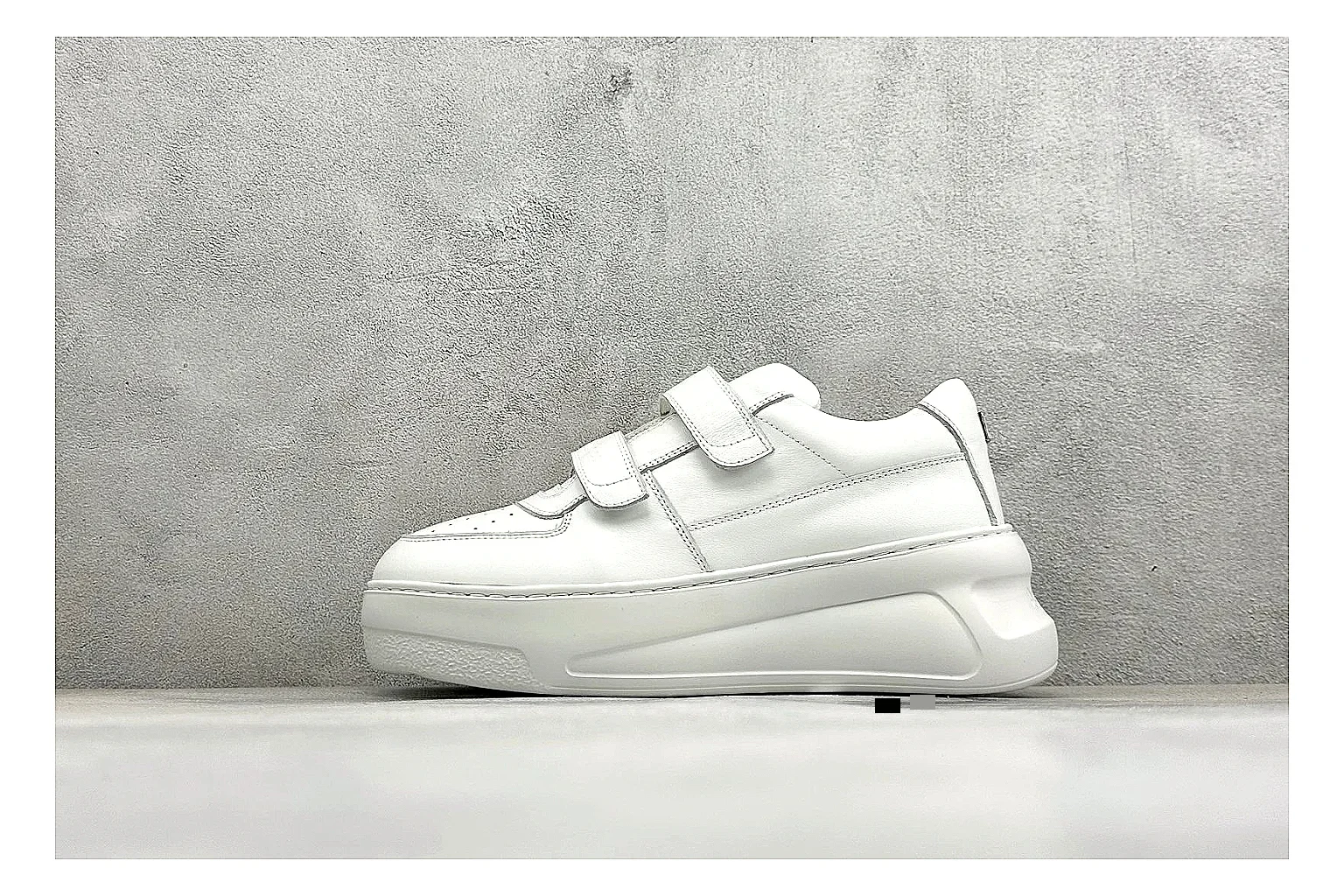 Acne Studios Velcro White Mid-Top QC reference image showing white leather panels, broad hook-and-loop straps, padded mid-top collar, and a clean rubber sole