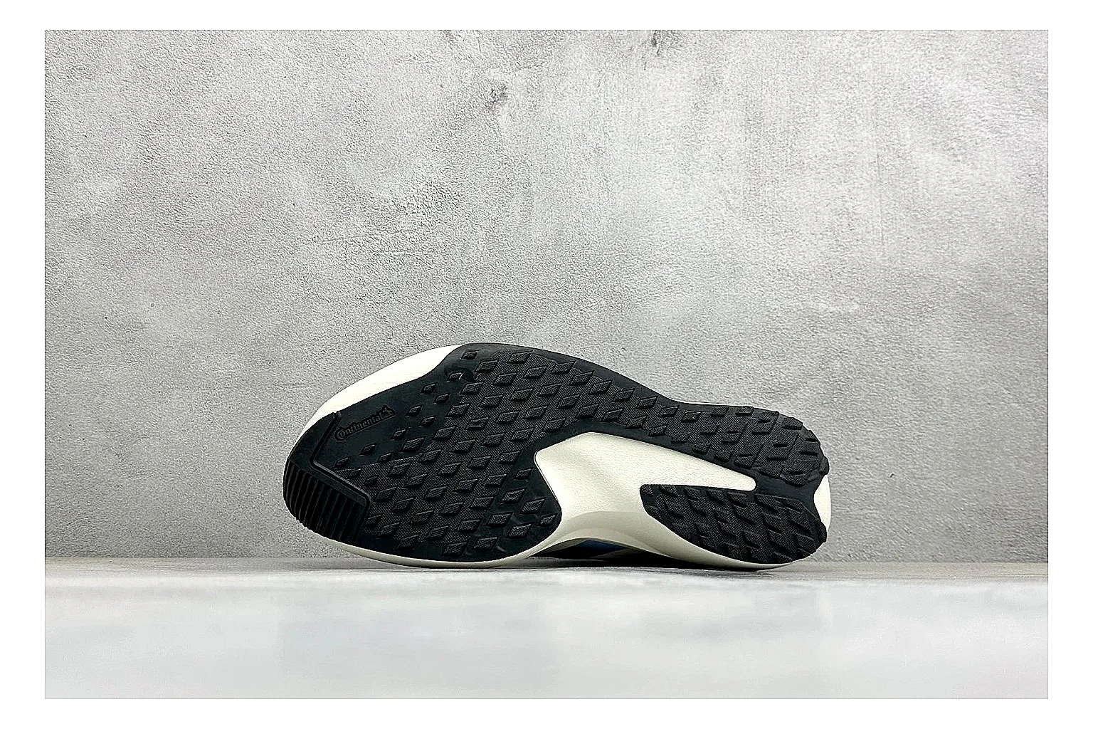 Adidas Adizero Evo Black QC reference photo showing black racing upper, sculpted white sole, Adidas striping, and lightweight performance silhouette thumbnail 3