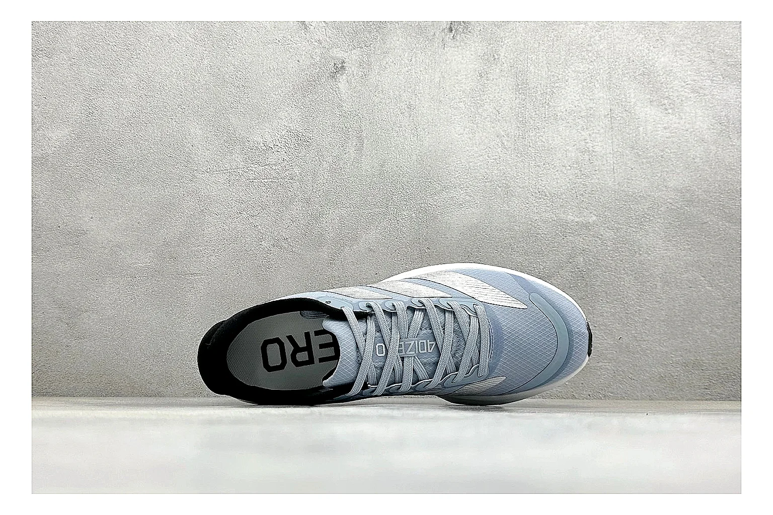 Adidas Adizero Grey Blue QC reference photo showing grey lightweight runner upper, blue Adidas striping, slim racing shape, and low performance sole thumbnail 6