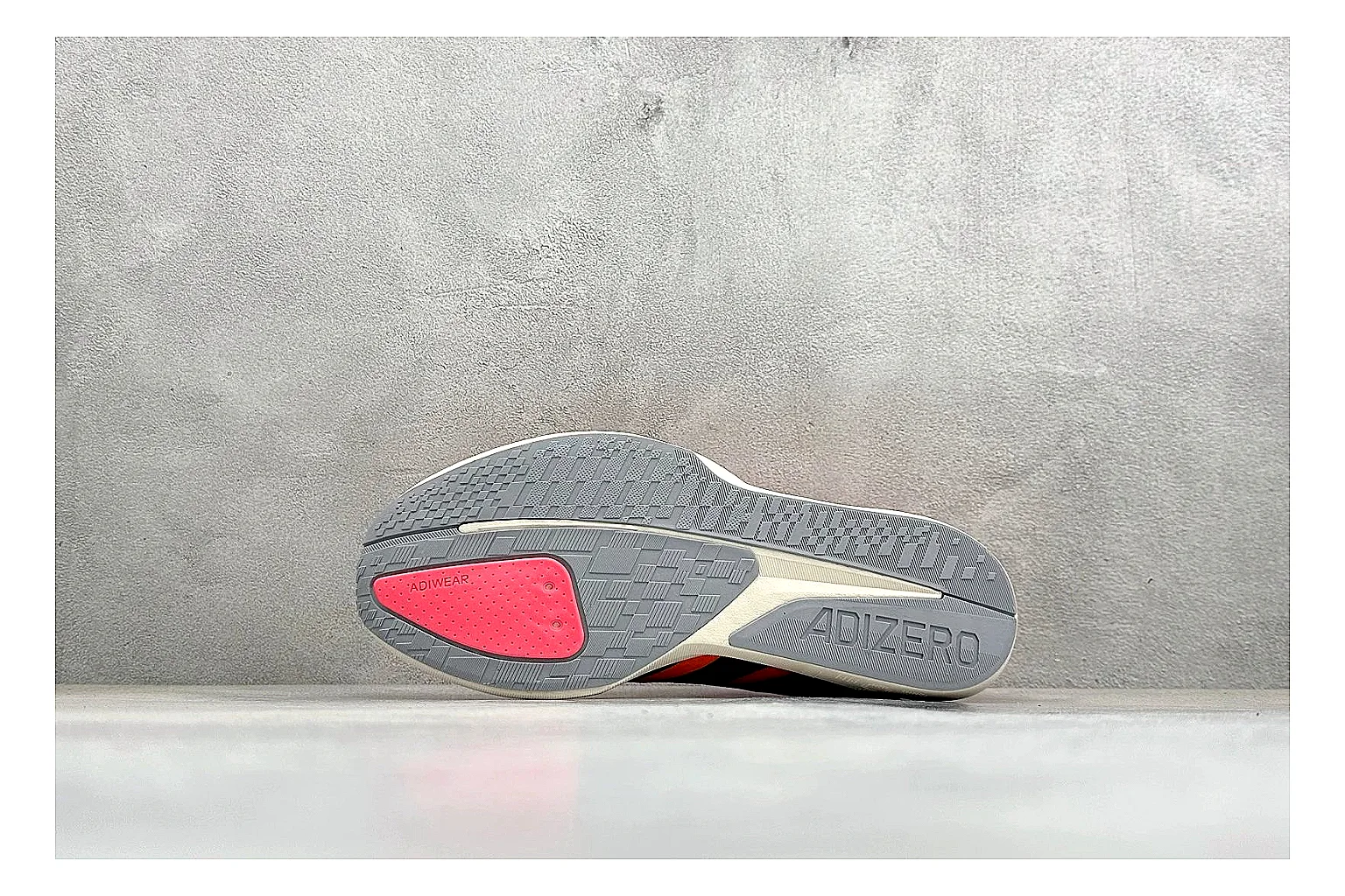 Adidas Adizero Orange Black QC reference photo showing orange runner upper, black three-stripe contrast, lightweight racing shape, and thin performance sole thumbnail 3
