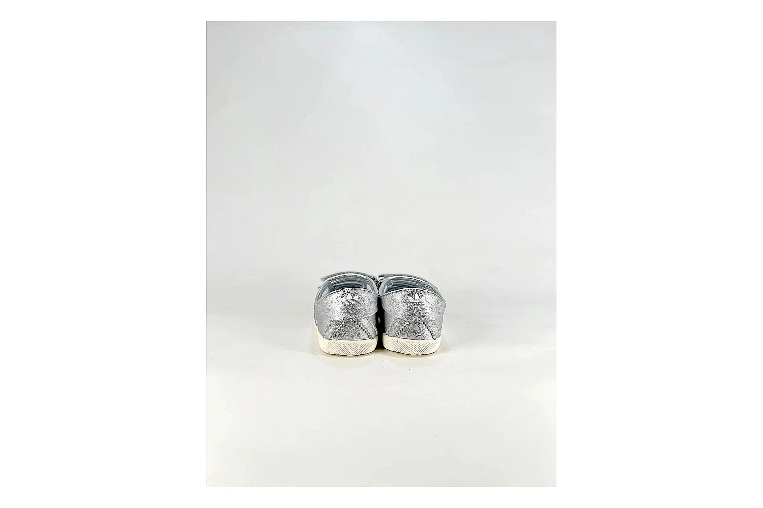 Adidas Originals Anfisa Silver Sneakers QC photo reference showing silver low-top sneakers with leather texture, side-profile shape, upper panel lines, and outsole detail thumbnail 2