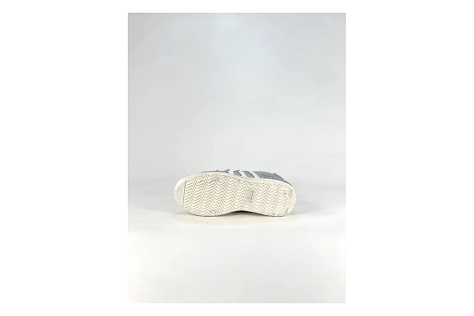 Adidas Originals Anfisa Silver Sneakers QC photo reference showing silver low-top sneakers with leather texture, side-profile shape, upper panel lines, and outsole detail thumbnail 3