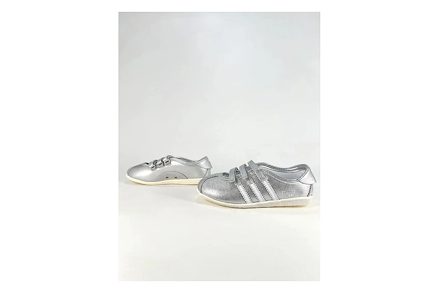 Adidas Originals Anfisa Silver Sneakers QC photo reference showing silver low-top sneakers with leather texture, side-profile shape, upper panel lines, and outsole detail thumbnail 4