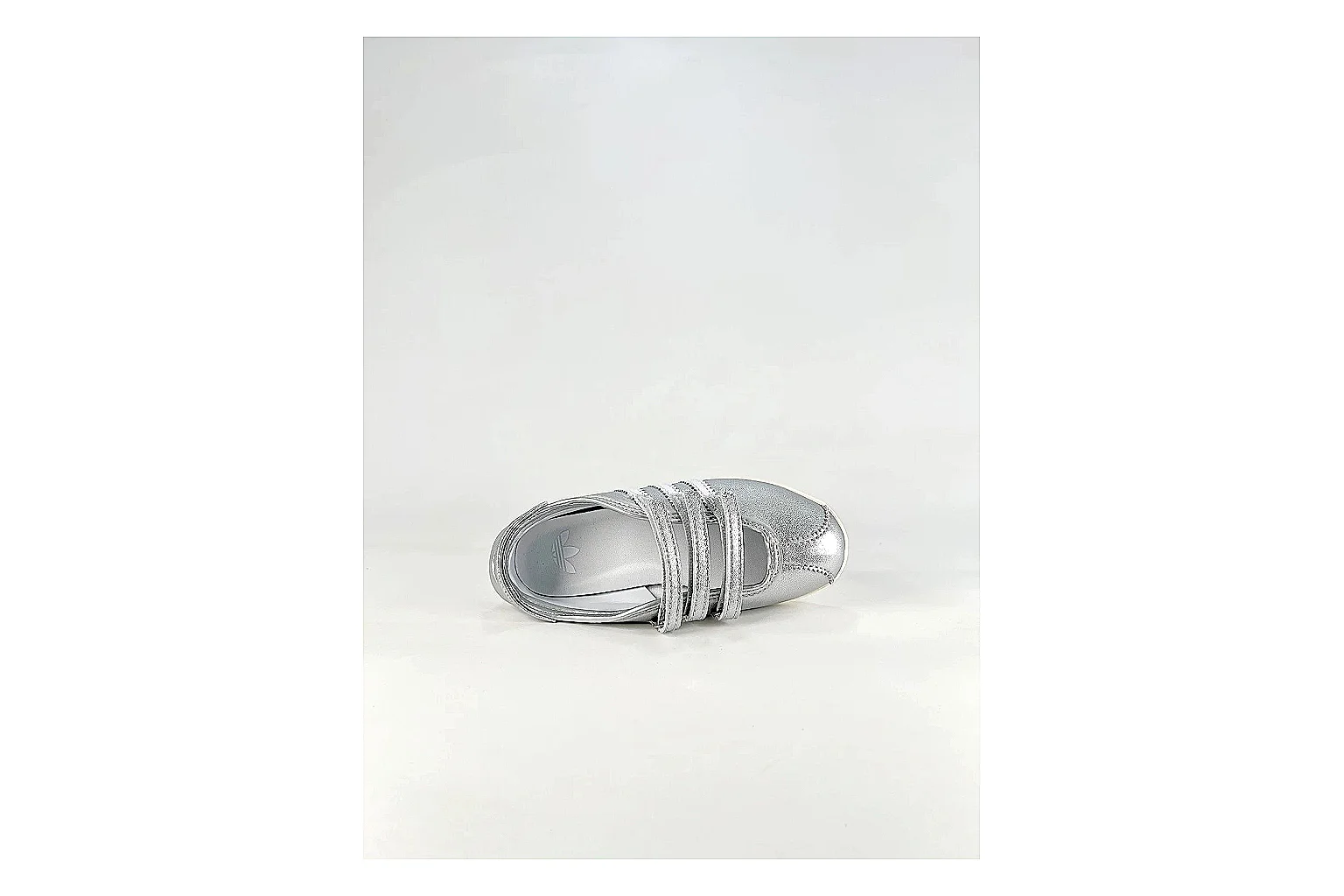 Adidas Originals Anfisa Silver Sneakers QC photo reference showing silver low-top sneakers with leather texture, side-profile shape, upper panel lines, and outsole detail thumbnail 6