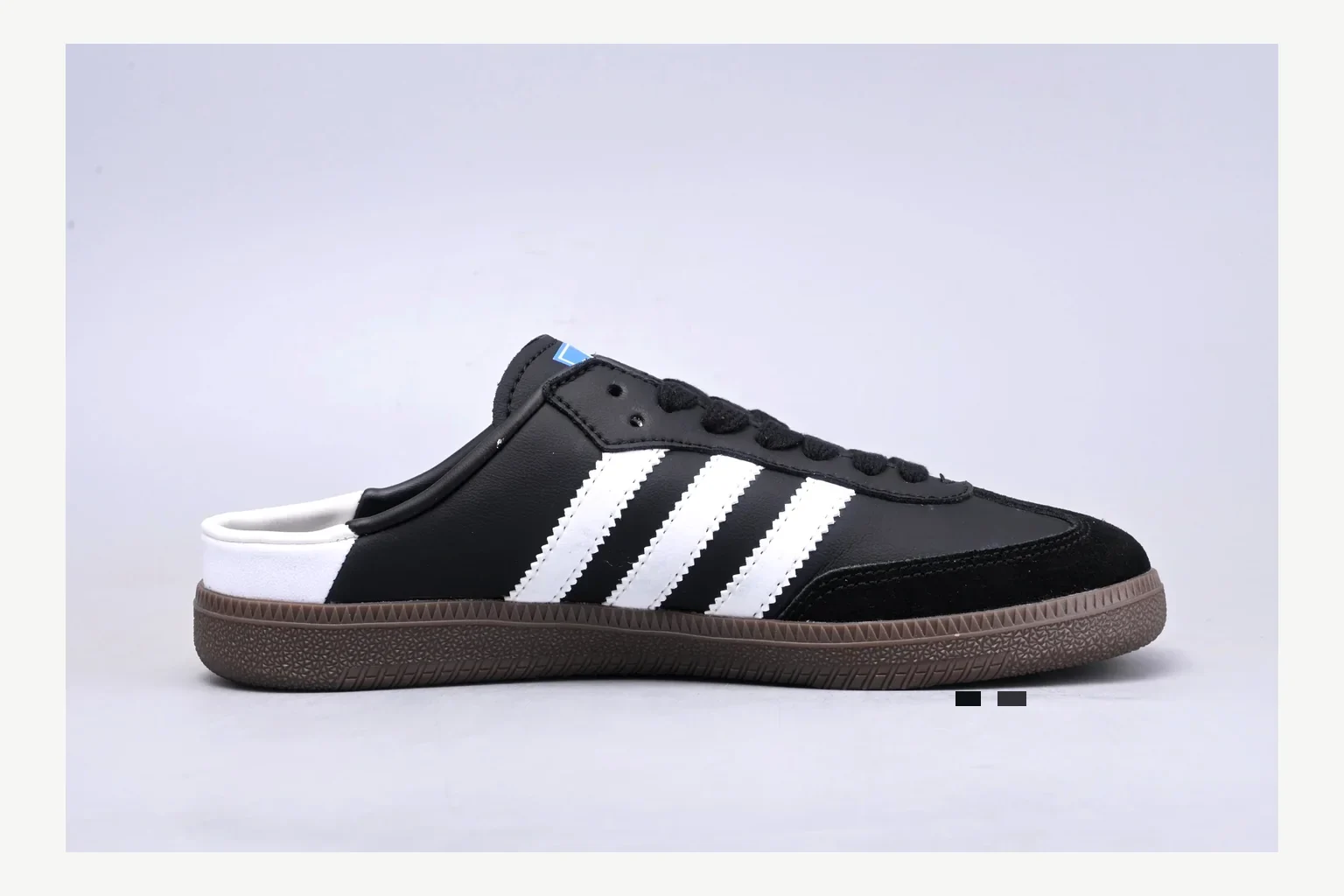 Adidas Originals Samba Black White QC photo showing white black low-top sneaker with mixed-material upper and low-profile shape