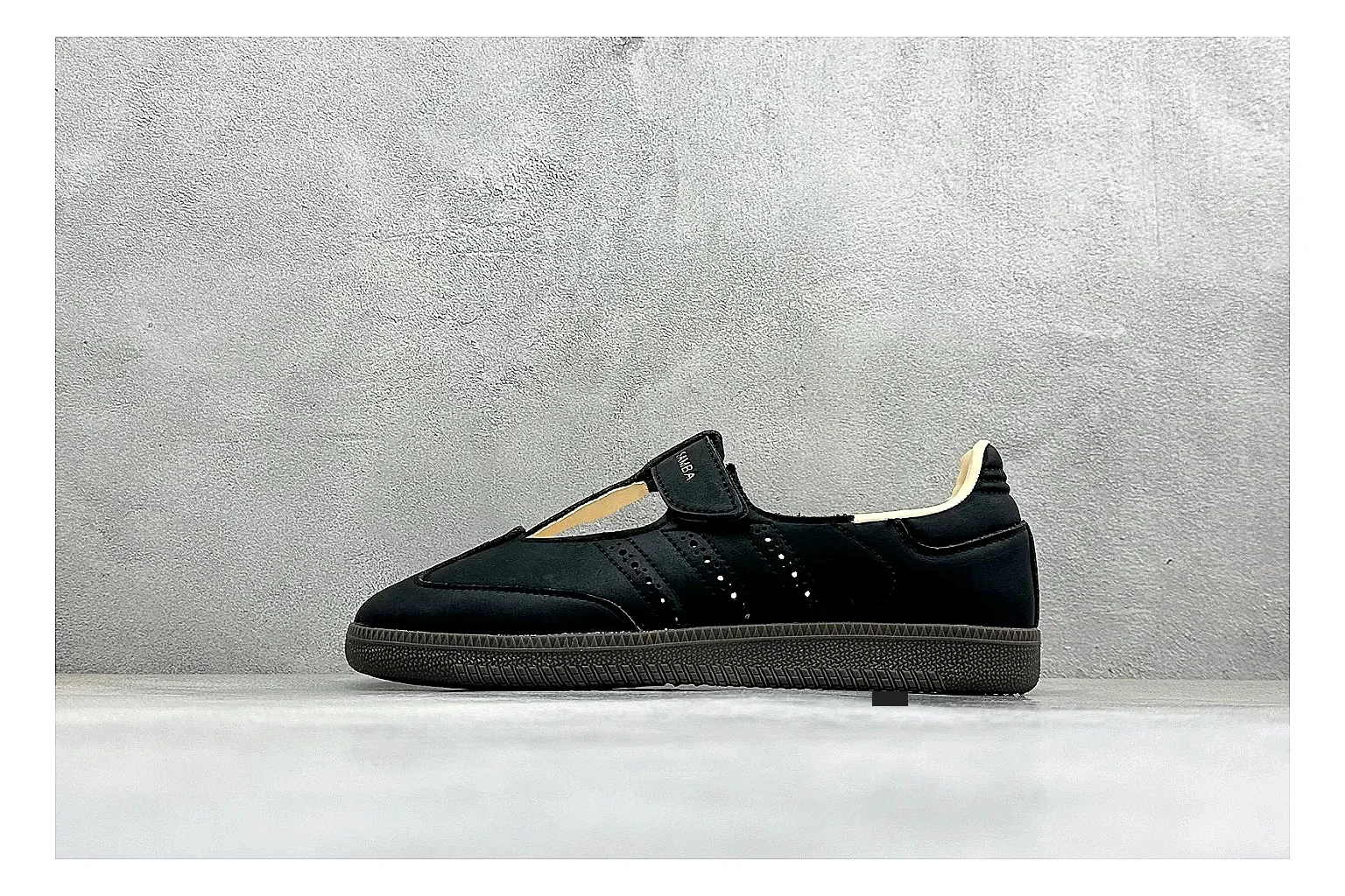 Adidas Samba Jane Black QC reference photo showing black Mary Jane upper, Samba-style stripes, strap closure, gum outsole, and low terrace shape