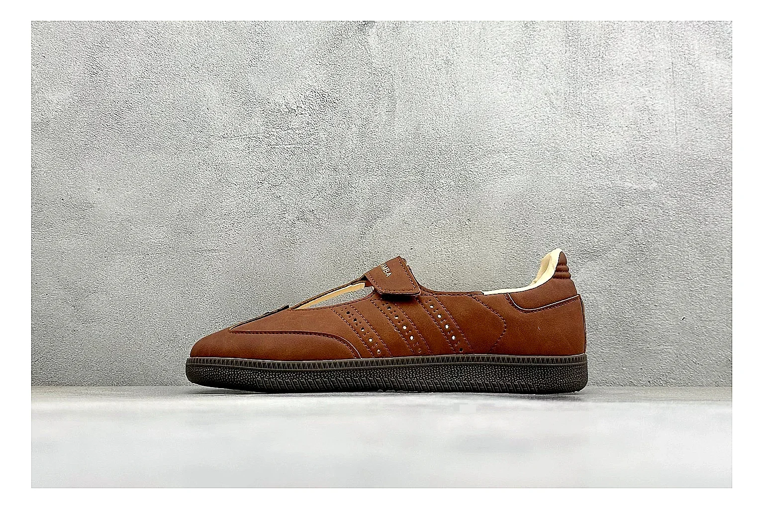 Adidas Samba Jane Brown QC reference photo showing brown Mary Jane upper, Samba-style side stripes, strap closure, gum outsole, and low terrace profile