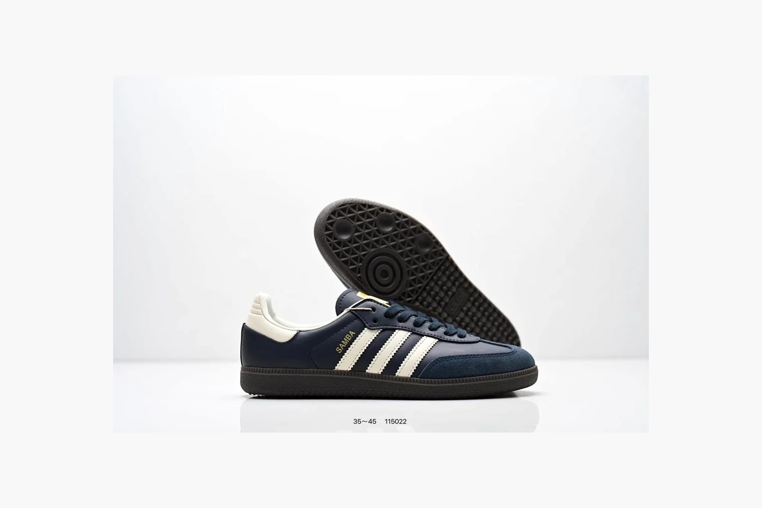 Adidas Samba OG Black White Gold QC reference photo showing black leather-suede low-top upper, white three stripes, gold tongue label, gum sole, and classic Samba side profile