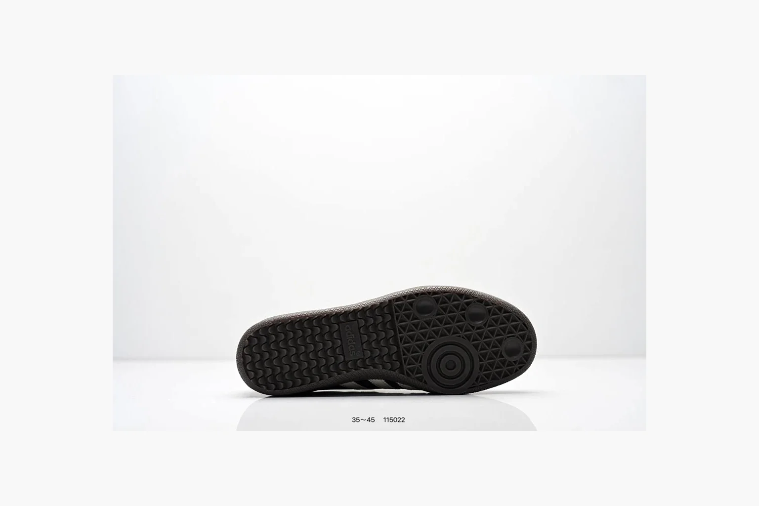 Adidas Samba OG Black White Gold QC reference photo showing black leather-suede low-top upper, white three stripes, gold tongue label, gum sole, and classic Samba side profile thumbnail 3