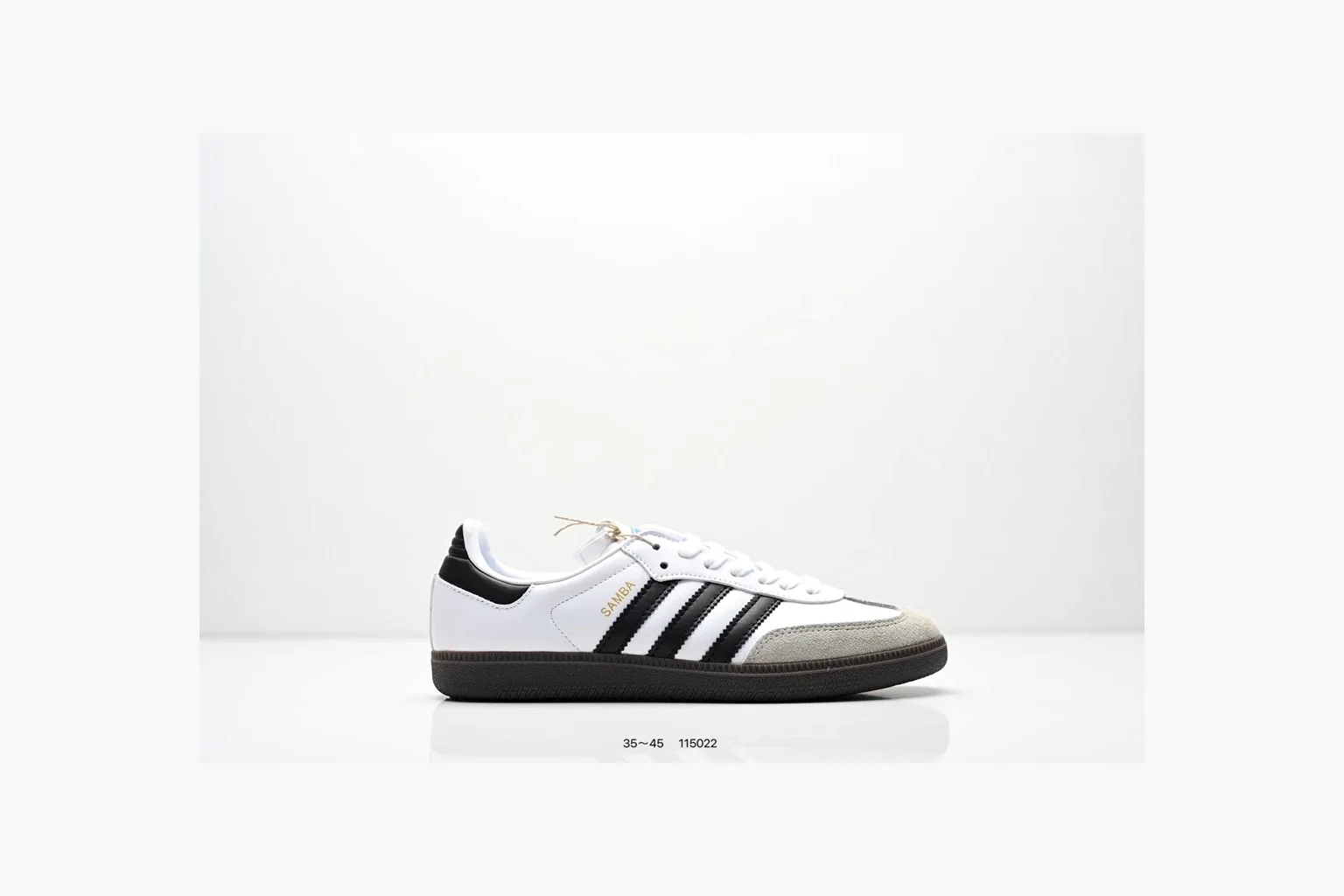 Adidas Samba OG White Black Blue QC reference photo showing white leather-suede low-top upper, black three stripes, blue heel detail, gum terrace sole, and slim Samba profile