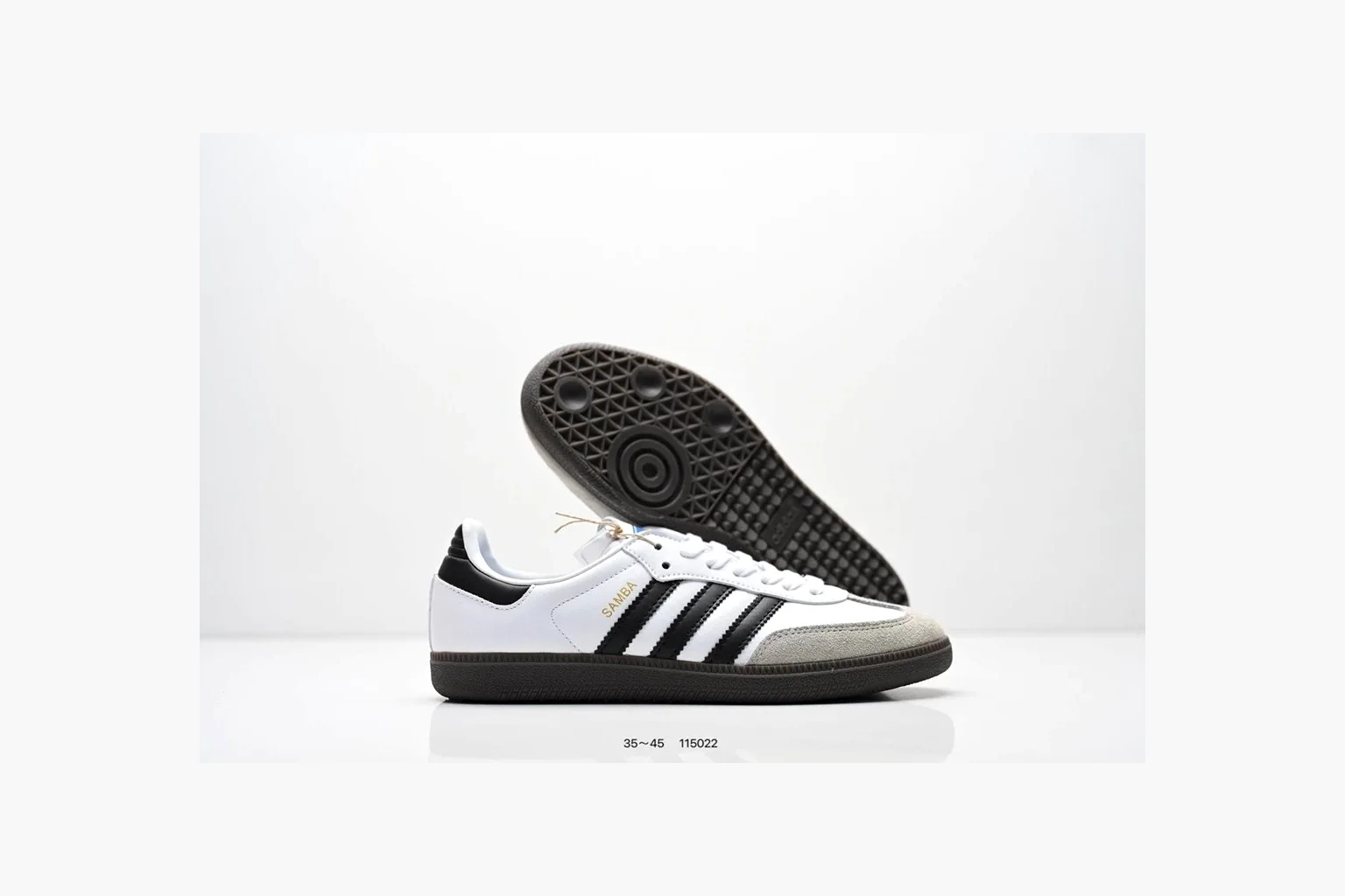 Adidas Samba OG White Black Blue QC reference photo showing white leather-suede low-top upper, black three stripes, blue heel detail, gum terrace sole, and slim Samba profile