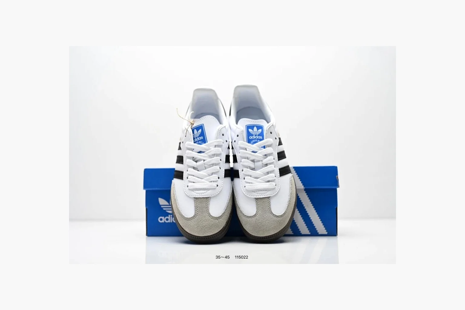 Adidas Samba OG White Black Blue QC reference photo showing white leather-suede low-top upper, black three stripes, blue heel detail, gum terrace sole, and slim Samba profile thumbnail 4