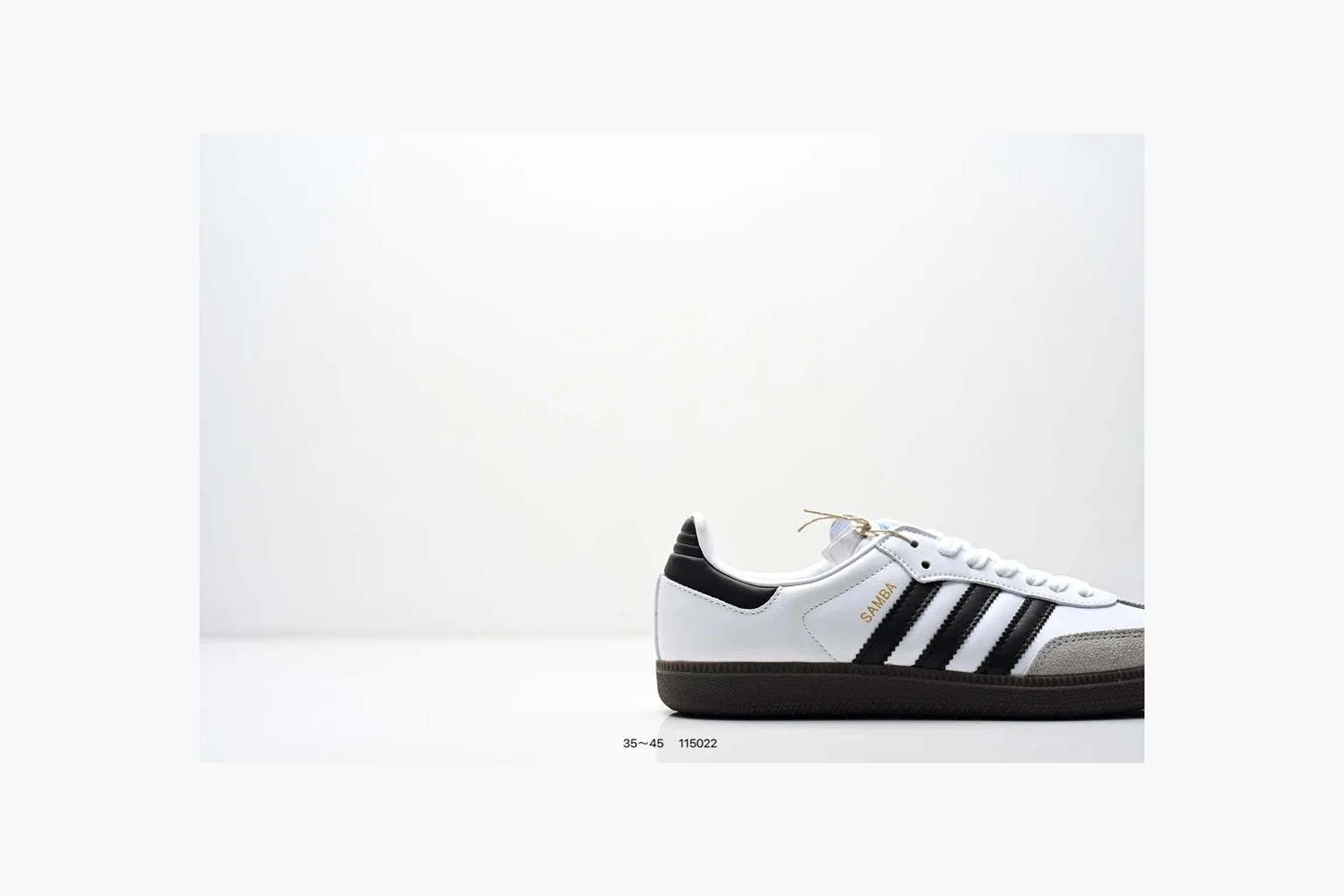Adidas Samba OG White Black Blue QC reference photo showing white leather-suede low-top upper, black three stripes, blue heel detail, gum terrace sole, and slim Samba profile thumbnail 5