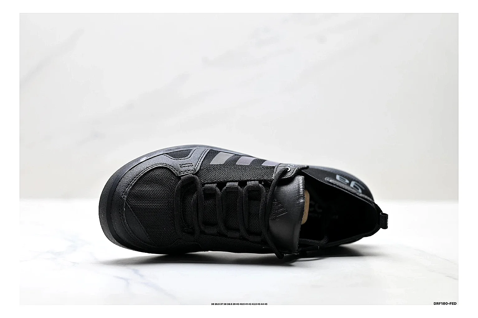 Adidas Terrex Daroga Black Sneakers QC photo reference showing black outdoor trail sneakers with mesh texture, side-profile shape, upper panel lines, and outsole detail thumbnail 6