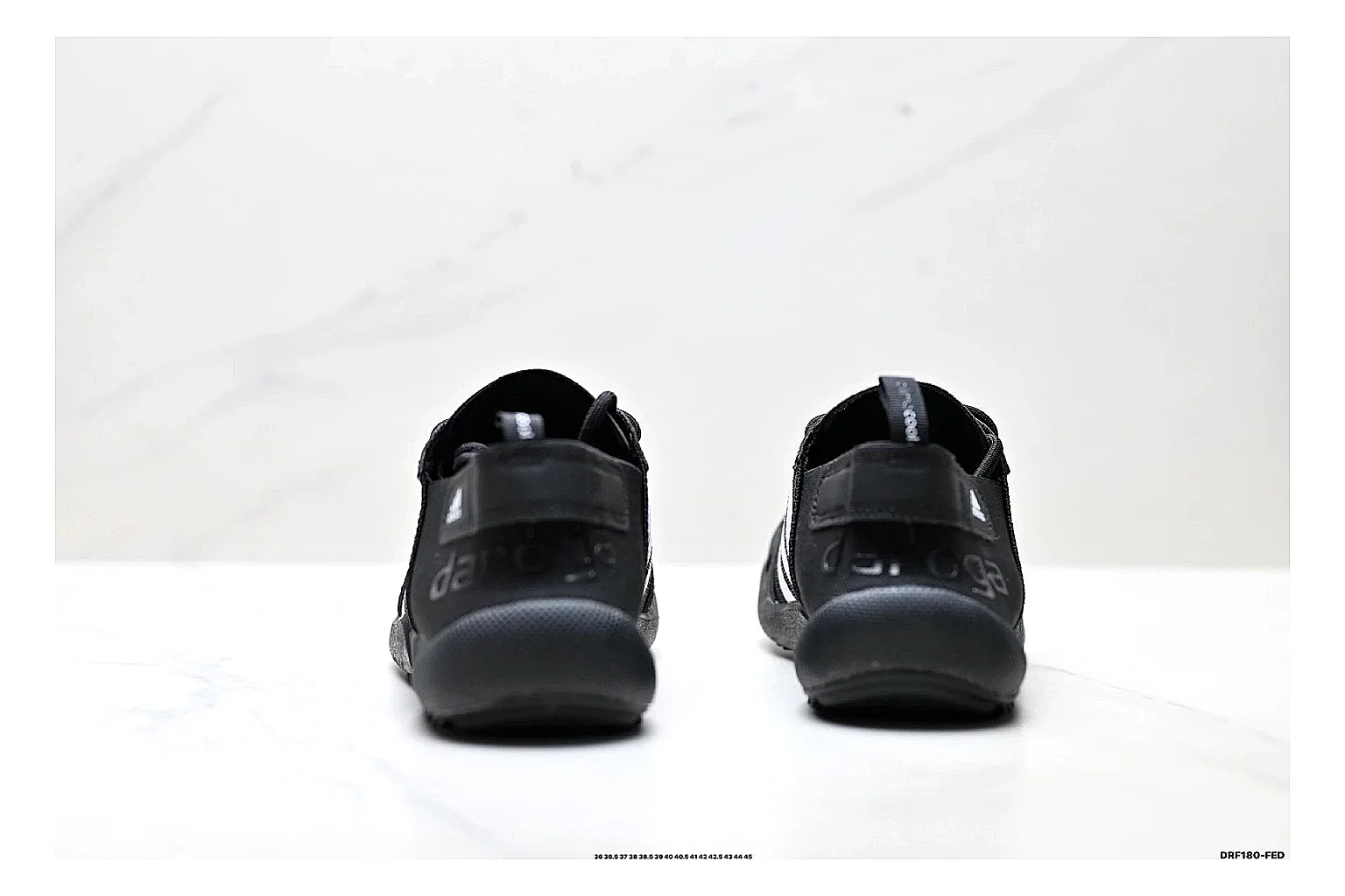 Adidas Terrex Daroga Black White Sneakers QC photo reference showing black white outdoor trail sneakers with mesh texture, side-profile shape, upper panel lines, and outsole detail