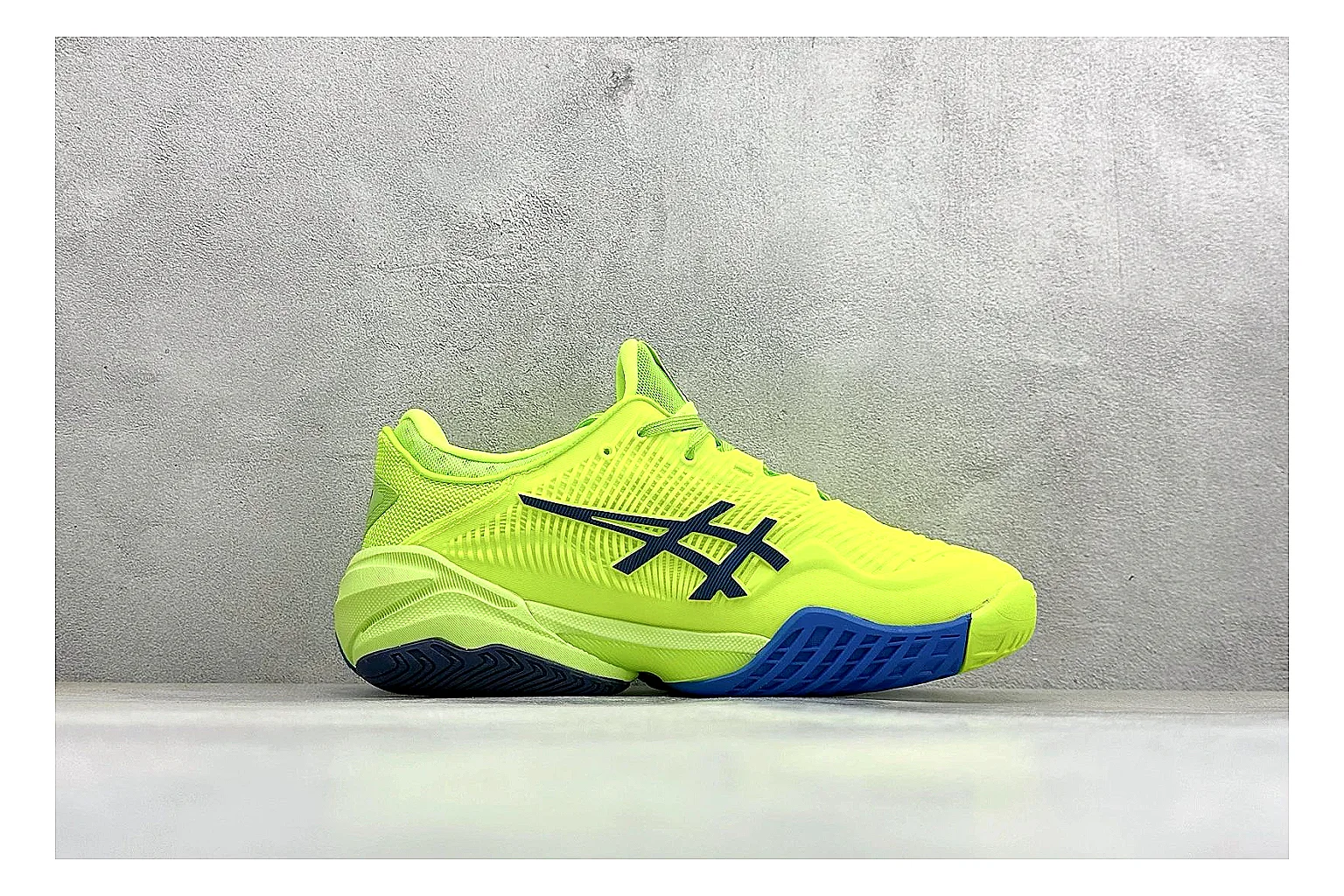 Asics Court FF Volt Blue QC reference photo showing bright volt and blue court upper, supportive sole wall, Asics side lines, and stable tennis profile thumbnail 5