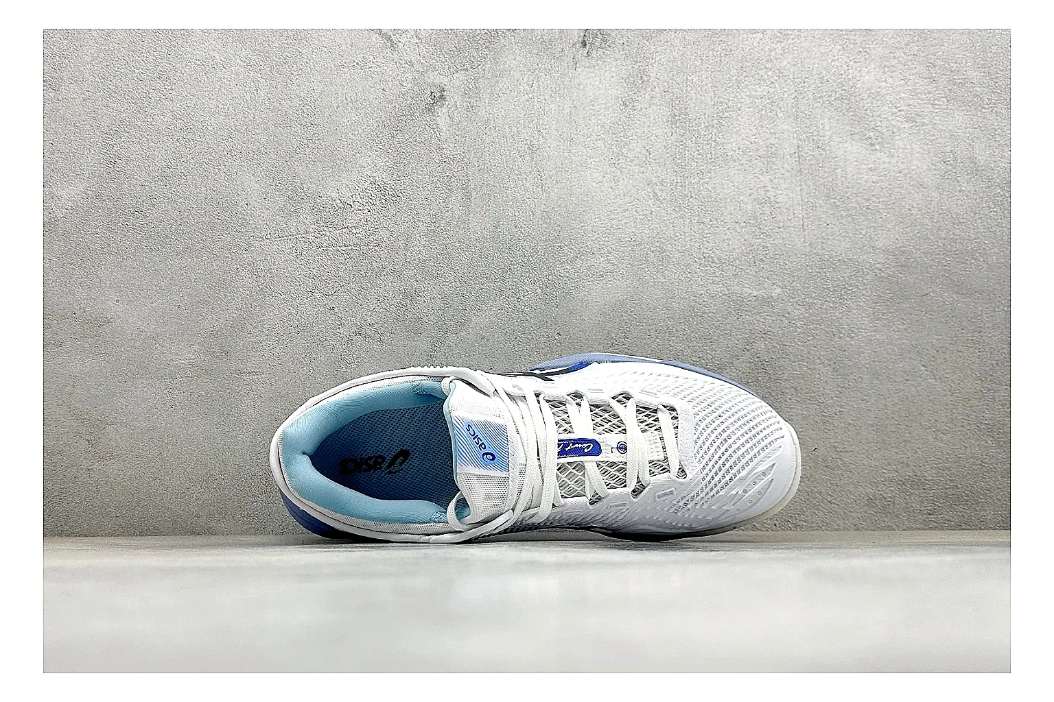Asics Court FF White Blue QC reference photo showing white tennis upper, blue Asics side lines, supportive sole wall, and stable court profile thumbnail 6