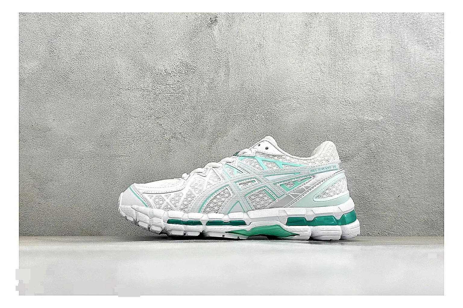 Asics Gel-Kayano White Mint QC reference photo showing white mesh runner upper, mint Asics accents, cushioned Gel-Kayano sole, and technical support shape