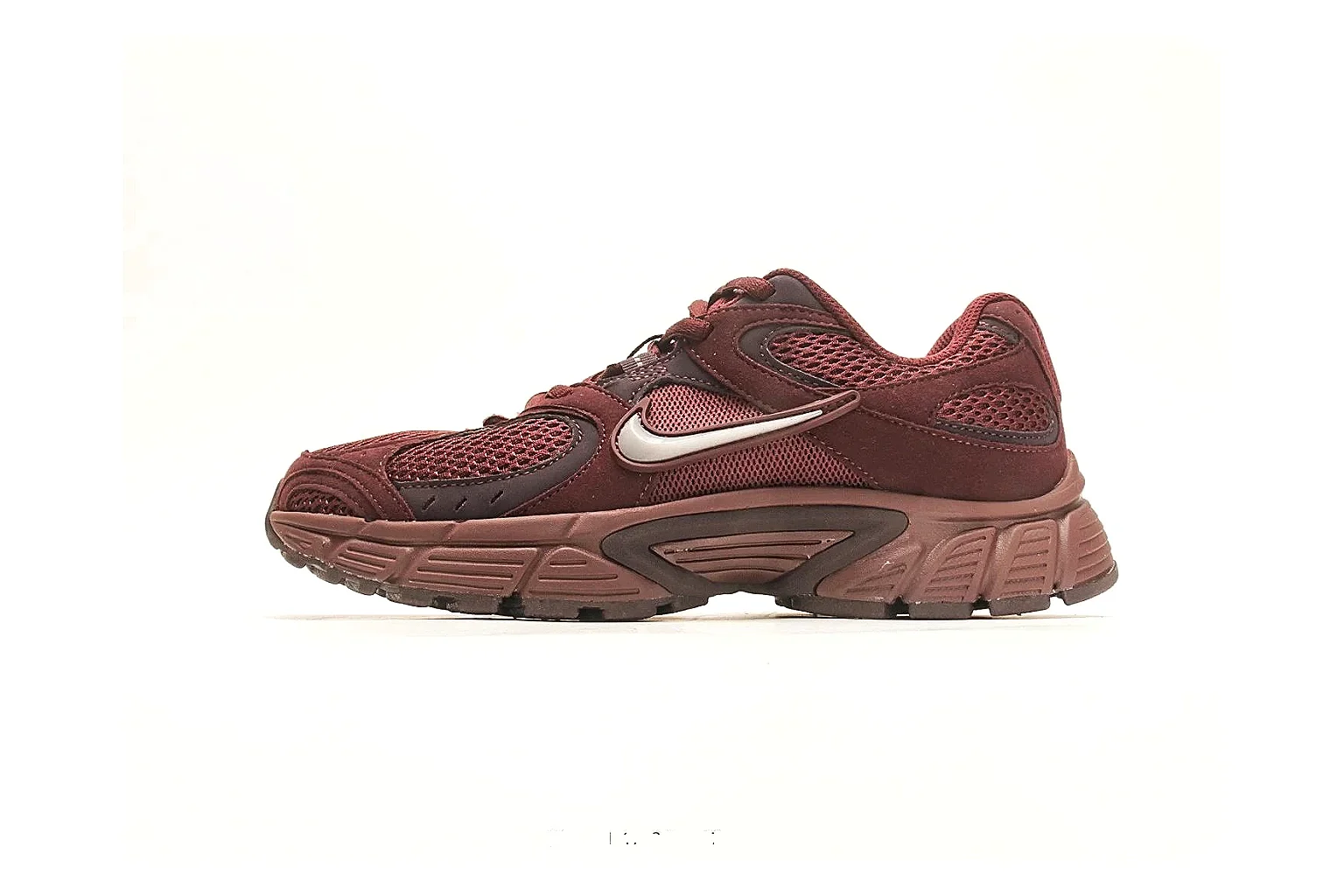 Asics Gel Runner Brown QC reference photo showing brown mesh-leather runner upper, layered Asics panels, retro running shape, and cushioned sole