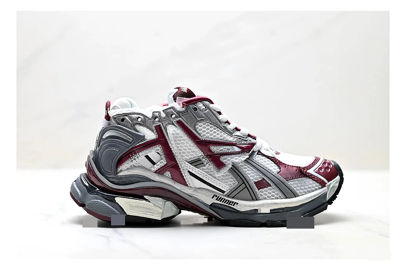 Asics Gel Runner Gray Burgundy QC reference photo showing gray mesh-leather runner upper, burgundy Asics accents, retro runner shape, and cushioned sole