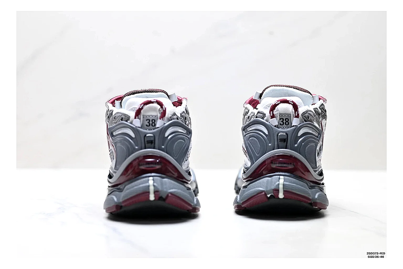 Asics Gel Runner Gray Burgundy QC reference photo showing gray mesh-leather runner upper, burgundy Asics accents, retro runner shape, and cushioned sole