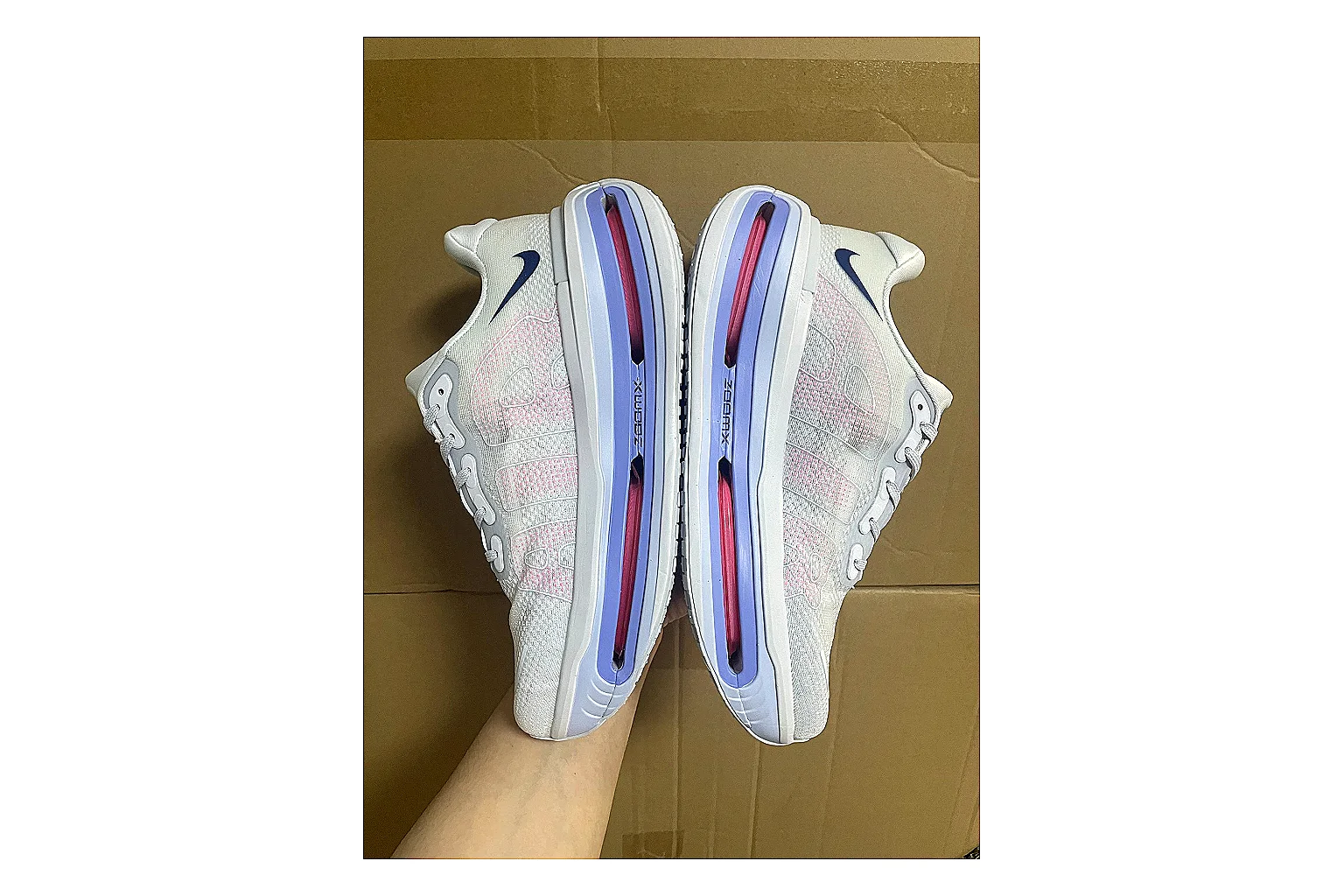 Asics Gel Runner White Purple QC reference photo showing white mesh-leather runner upper, purple Asics accents, retro running shape, and cushioned sole