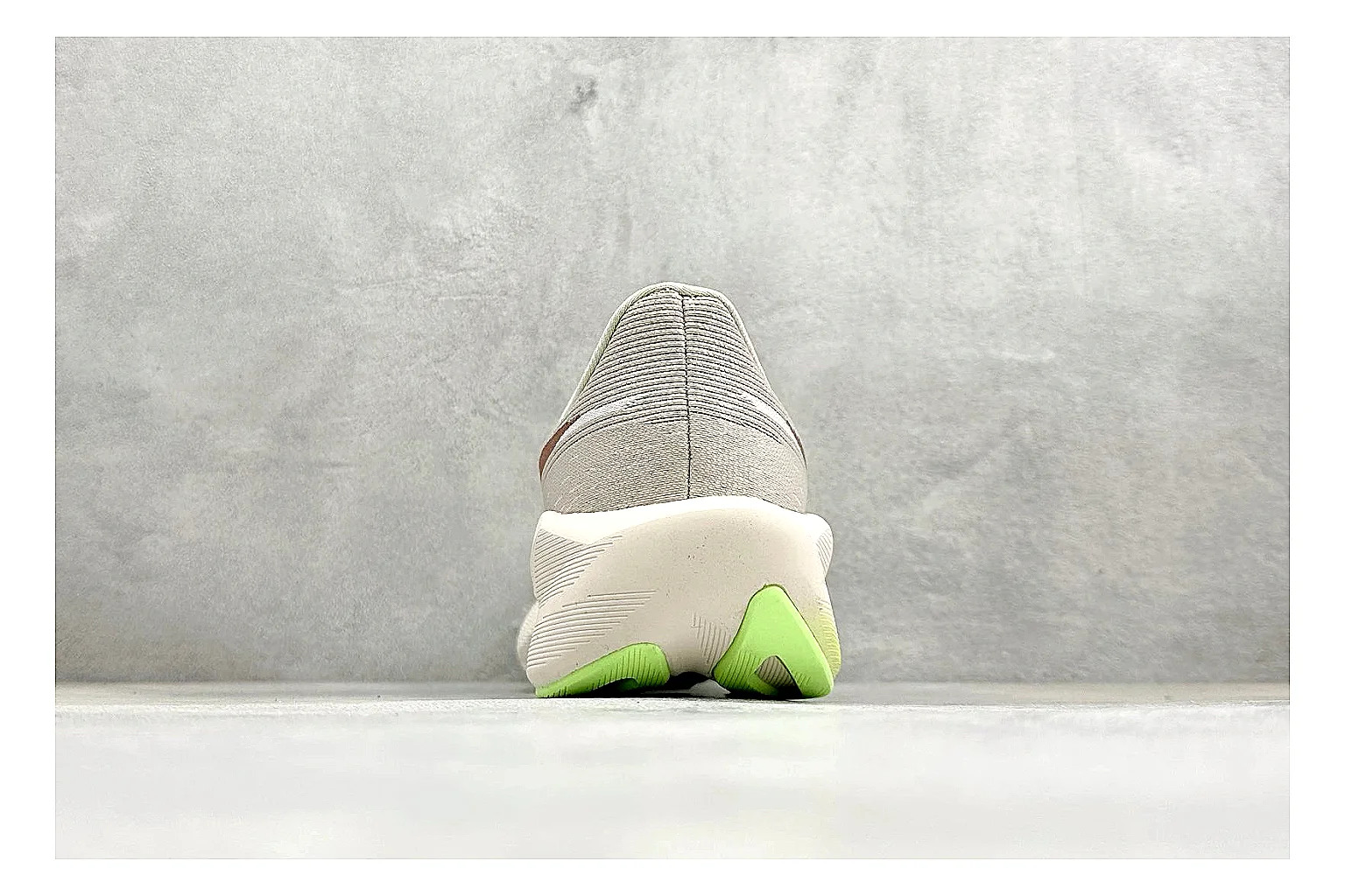 Asics Novablast 6 Cream Green QC reference photo showing cream running mesh, green side accents, tall cushioned sole, and modern training silhouette