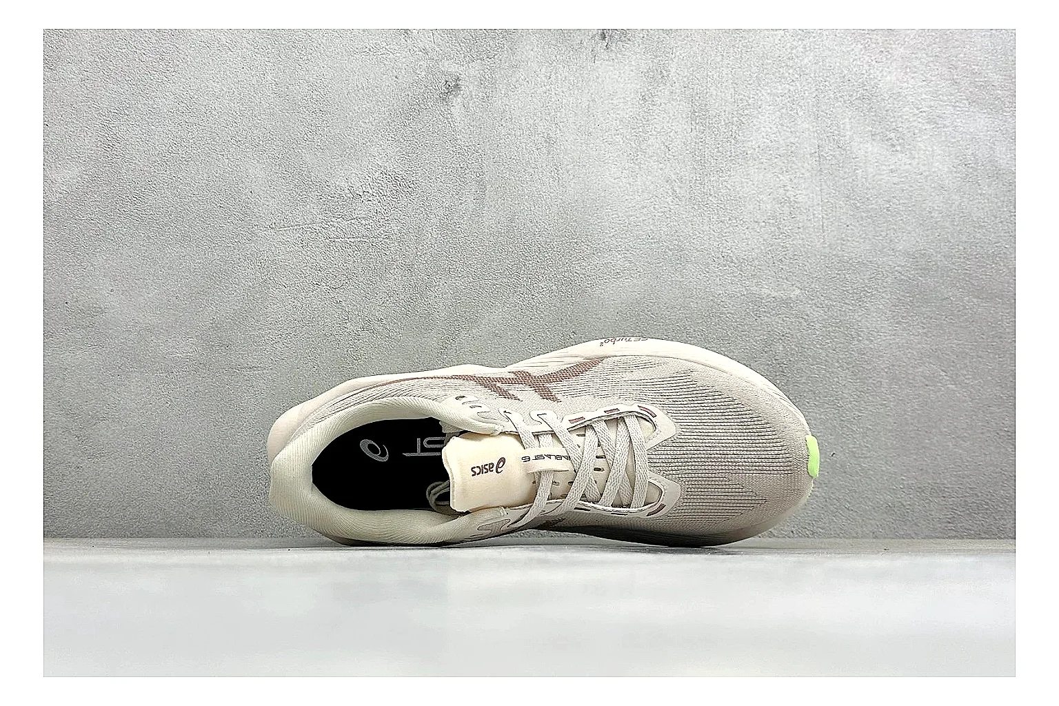 Asics Novablast 6 Cream Green QC reference photo showing cream running mesh, green side accents, tall cushioned sole, and modern training silhouette thumbnail 6