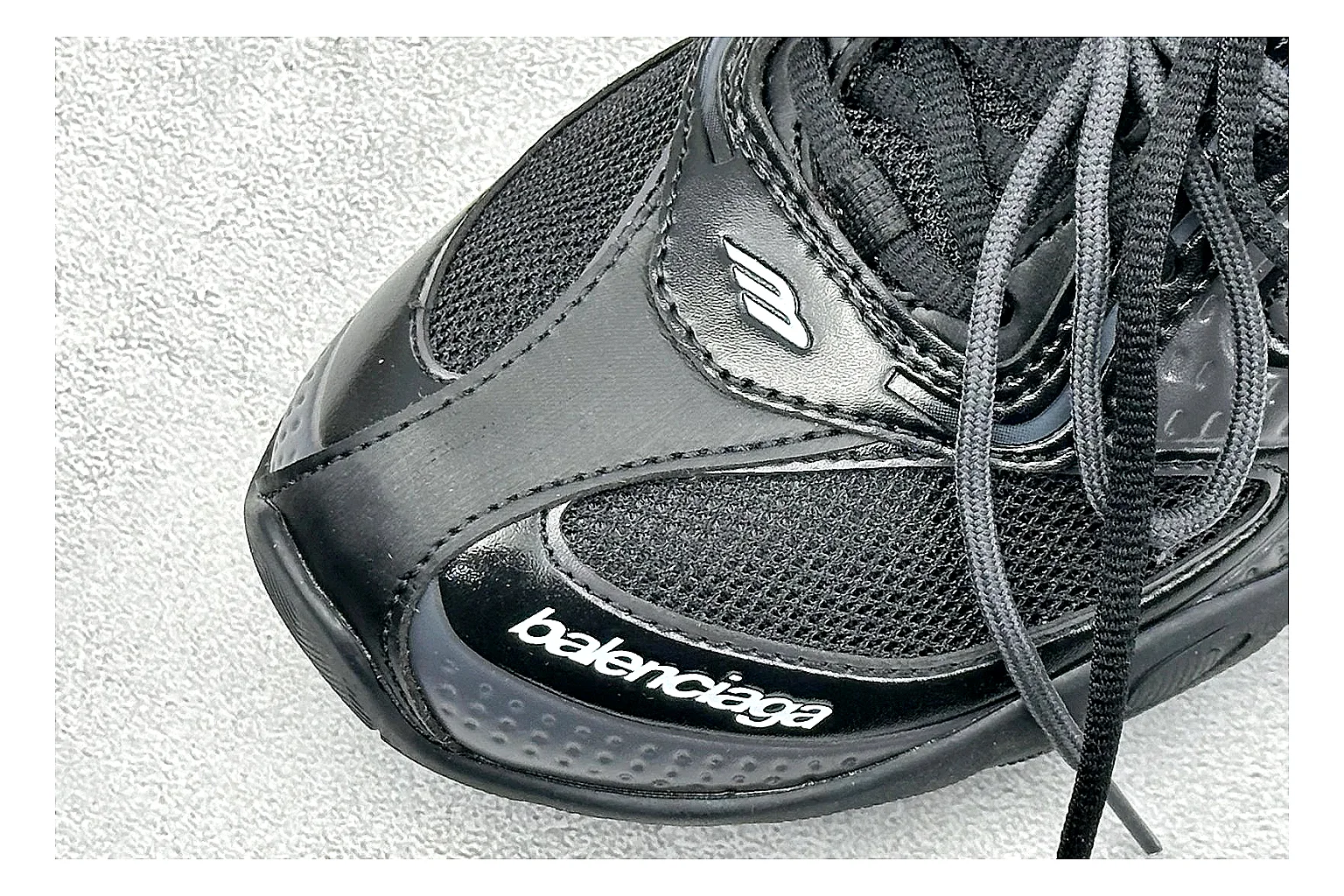 Balenciaga Track Black Low-Top QC reference photo showing black layered technical upper, complex paneling, chunky runner sole, and tactical low-top shape thumbnail 4