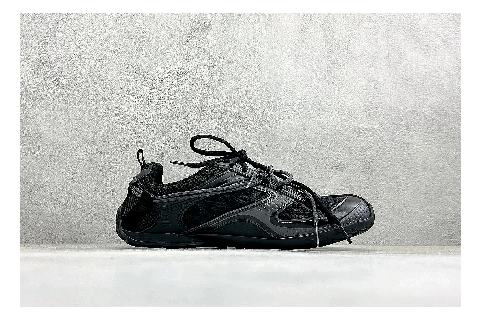 Balenciaga Track Black Low-Top QC reference photo showing black layered technical upper, complex paneling, chunky runner sole, and tactical low-top shape thumbnail 5