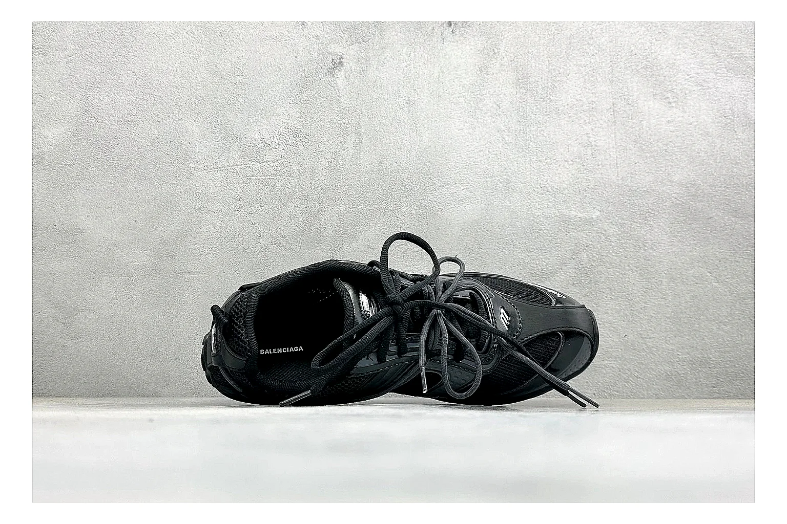 Balenciaga Track Black Low-Top QC reference photo showing black layered technical upper, complex paneling, chunky runner sole, and tactical low-top shape thumbnail 6