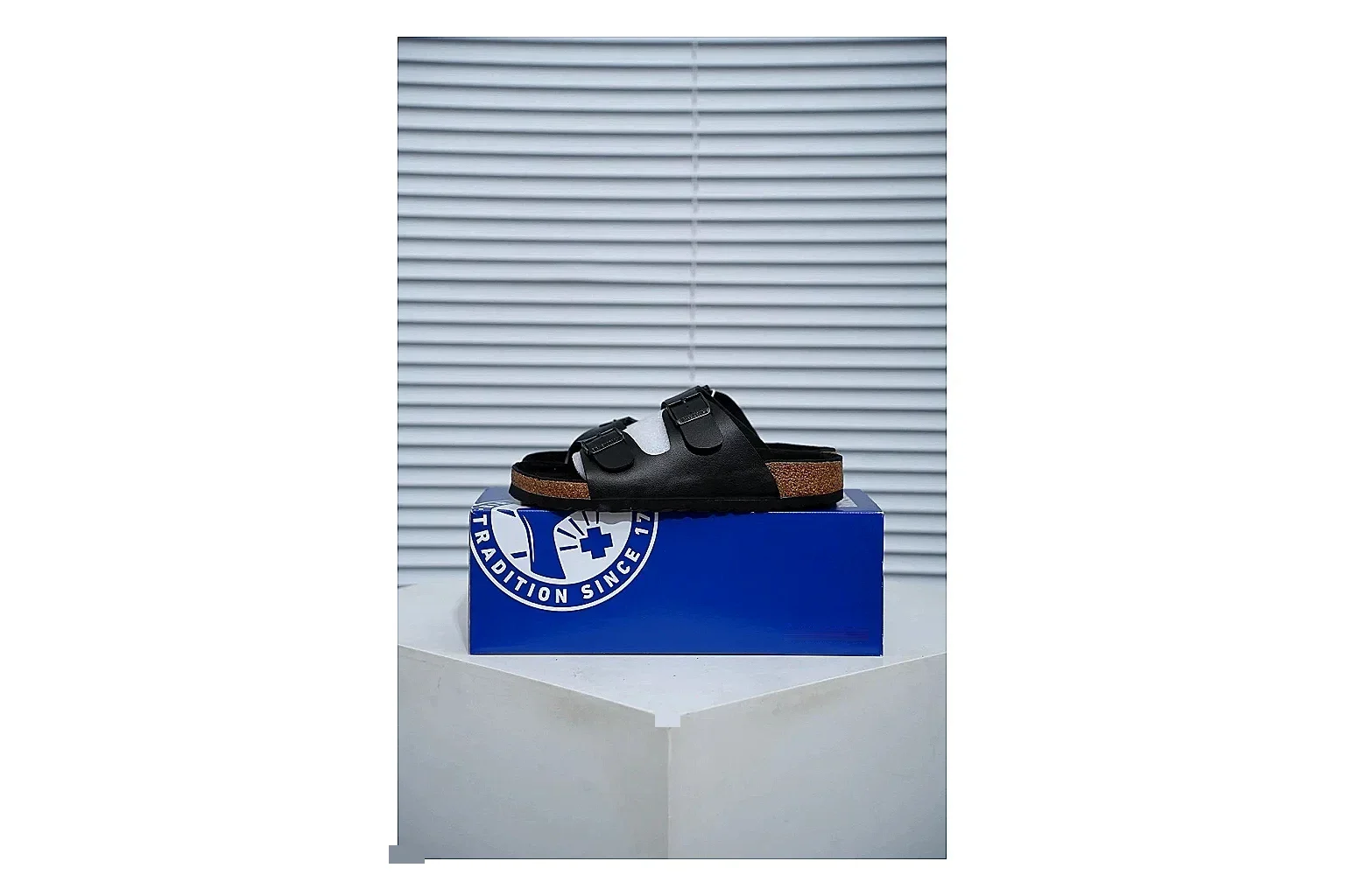 Birkenstock Arizona Black Cork Slide QC photo showing adjustable buckles, contoured footbed and dark outsole for versatile casual looks