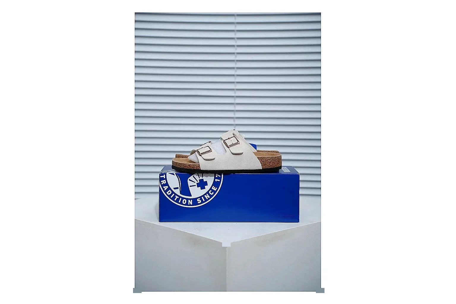 Birkenstock Arizona Cream Cork Slide QC photo showing adjustable buckles, soft neutral upper and contoured footbed for easy casual wear