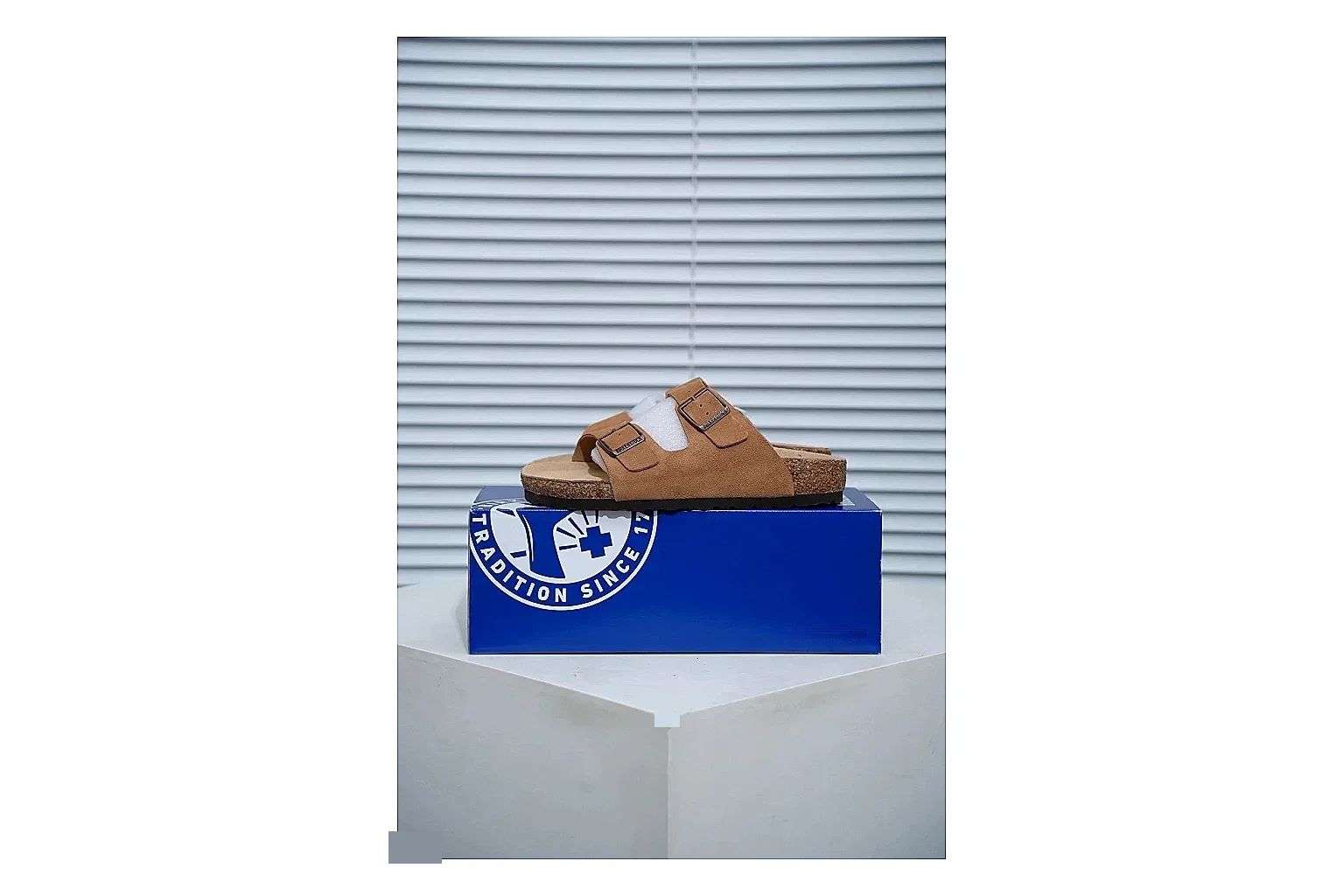 Birkenstock Arizona Tan Cork Slide QC photo showing warm brown upper, adjustable buckles and contoured footbed for easy casual outfits