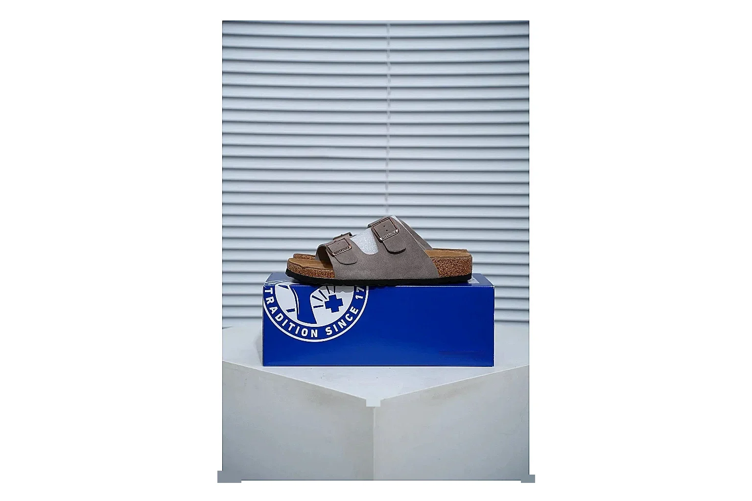 Birkenstock Arizona Taupe Cork Slide QC photo showing suede-look upper, adjustable buckles and contoured footbed for natural everyday styling