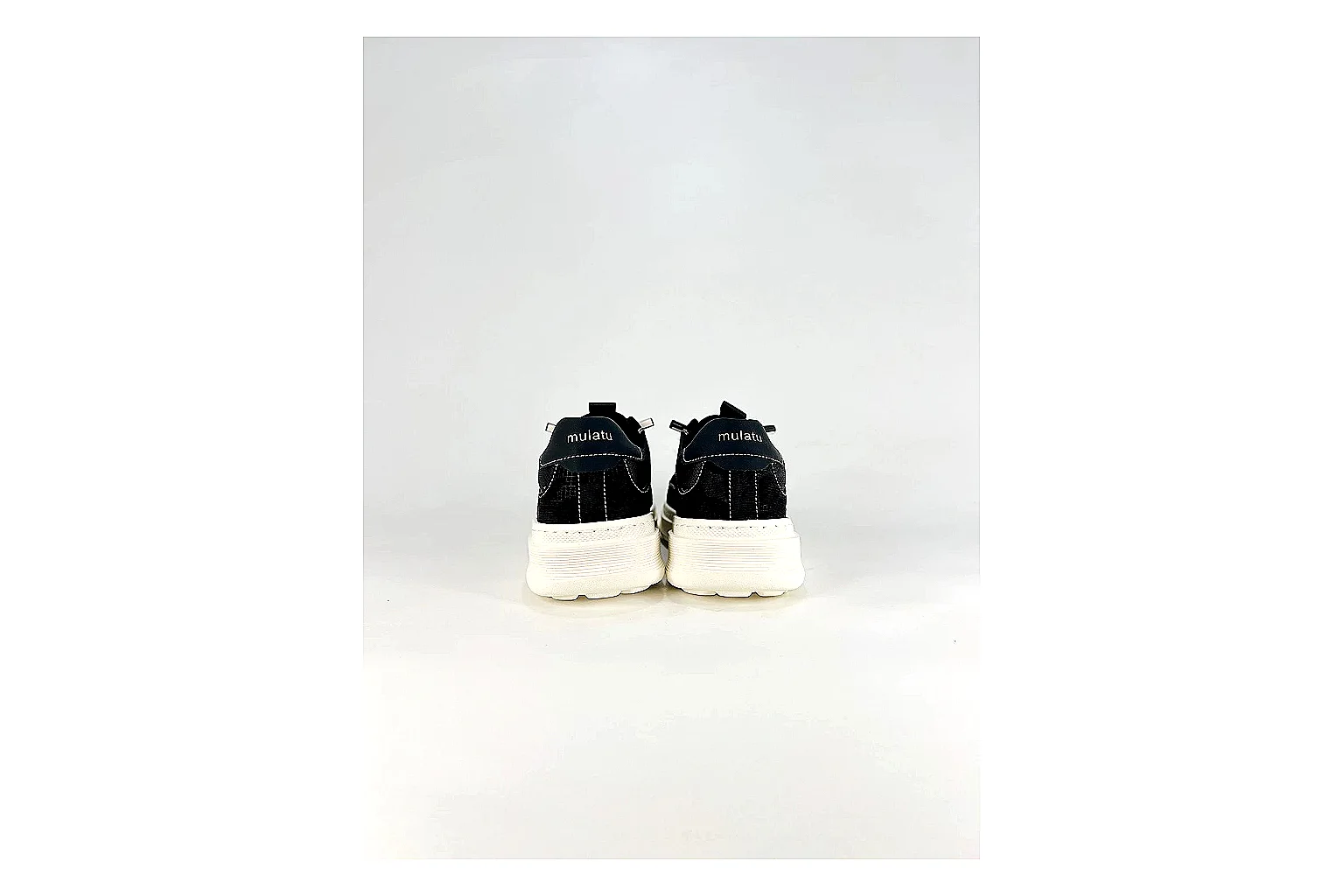 Boss Low Top Black White QC reference photo showing black white leather low-top upper, minimal casual profile, clean panels, and simple rubber sole thumbnail 3