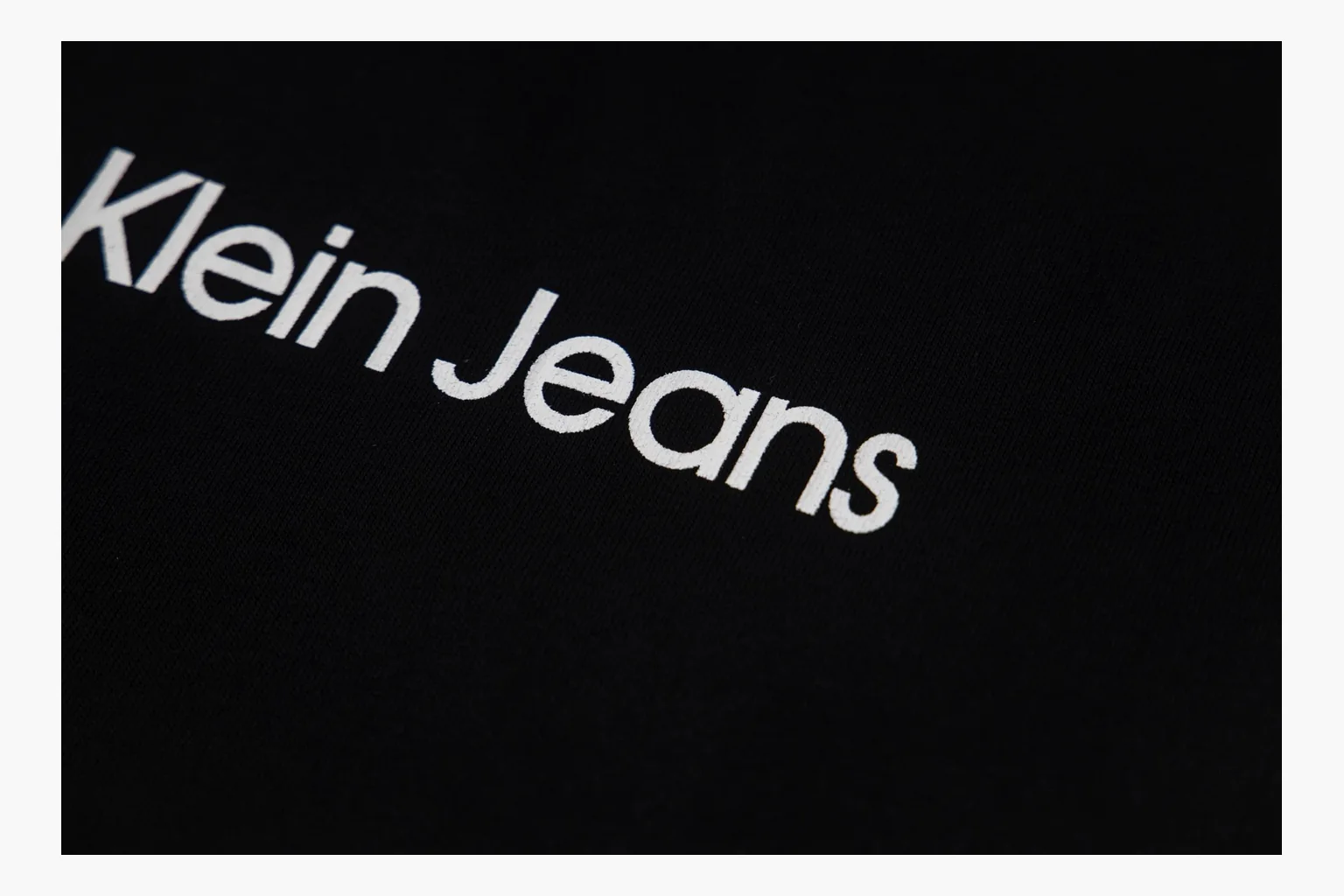 Calvin Klein black V-neck tee QC photo with chest print thumbnail 2