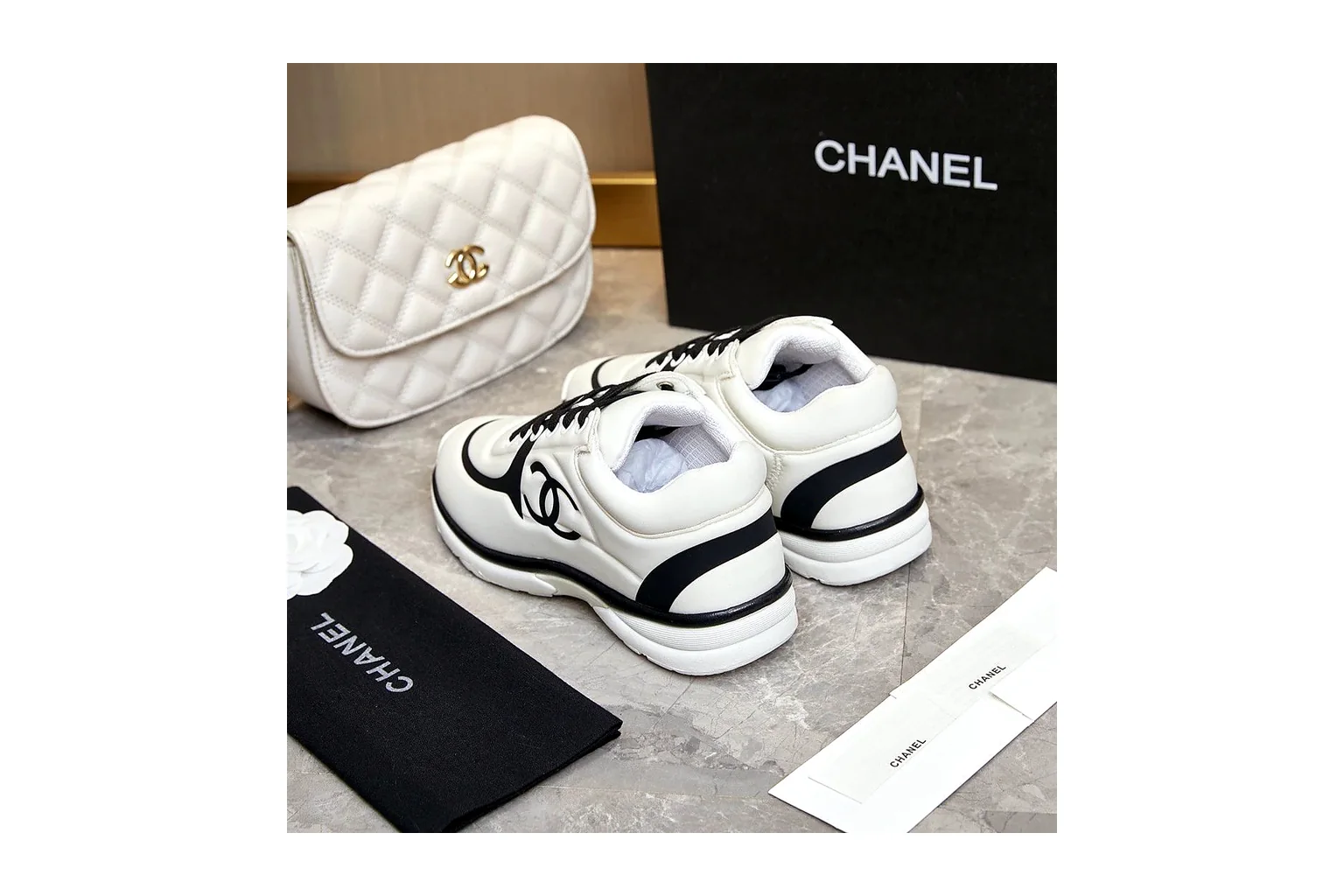 Chanel CC Low Top White Black luxury low top six photo view thumbnail 2