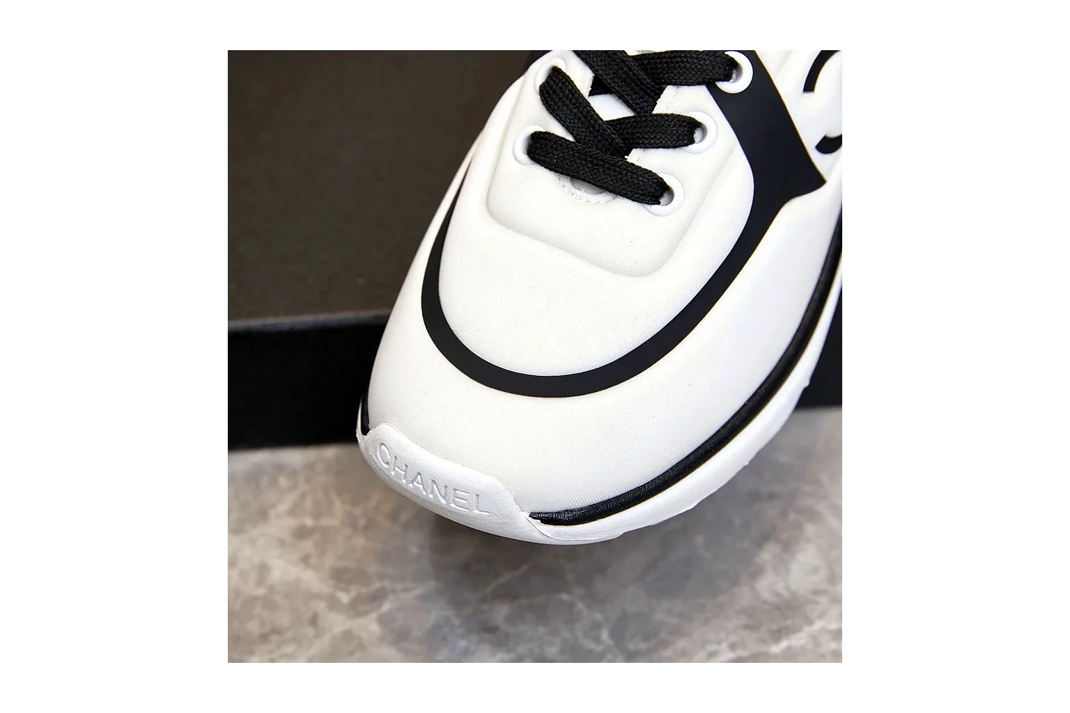 Chanel CC Low Top White Black luxury low top six photo view thumbnail 3