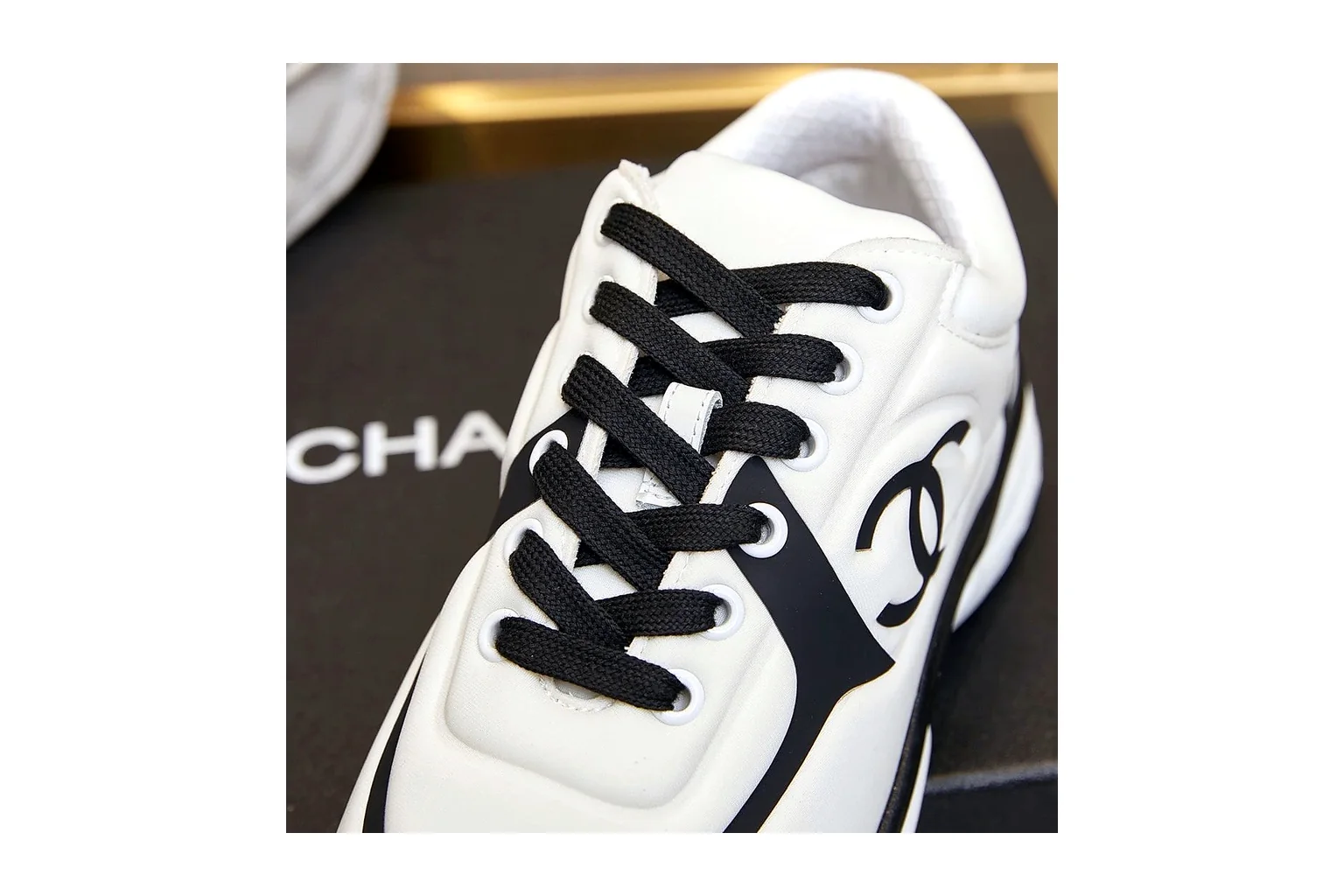 Chanel CC Low Top White Black luxury low top six photo view thumbnail 4
