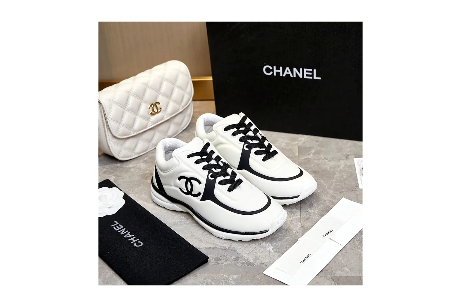 Chanel CC Low Top White Black luxury low top six photo view thumbnail 5