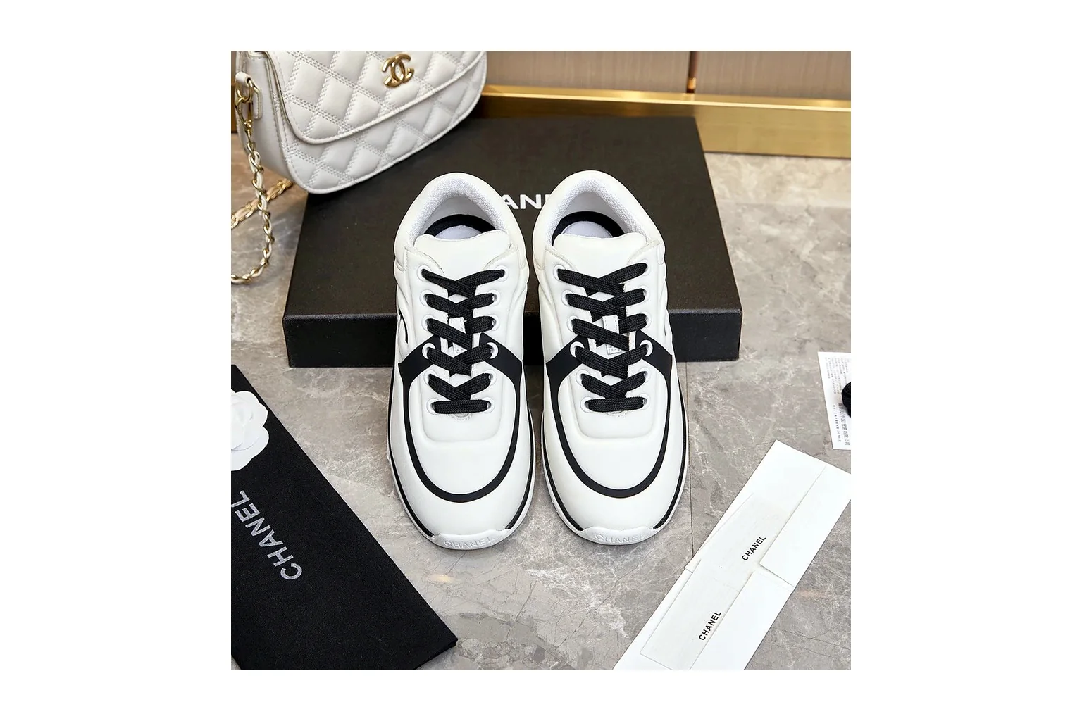Chanel CC Low Top White Black luxury low top six photo view thumbnail 6