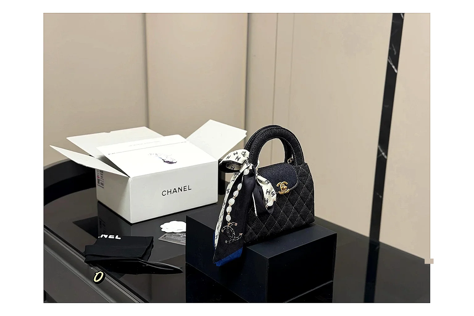 Chanel Quilted Chain Bag Black QC reference photo showing black quilted leather body, chain strap, flap profile, and polished luxury hardware