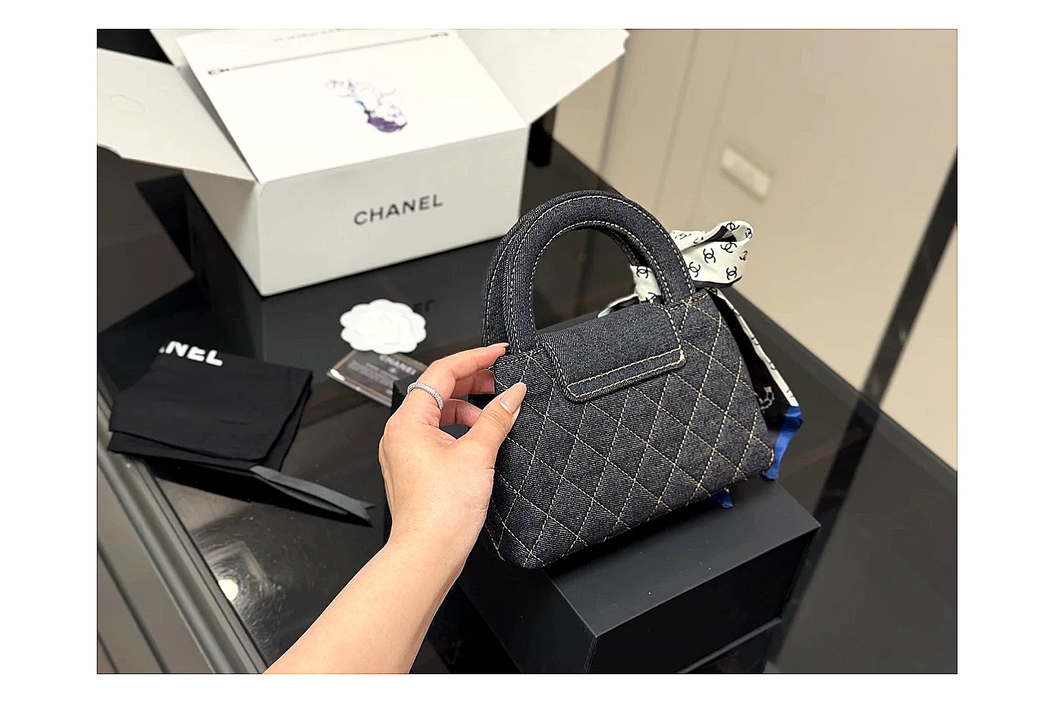 Chanel Quilted Chain Bag Black QC reference photo showing black quilted leather body, chain strap, flap profile, and polished luxury hardware thumbnail 4