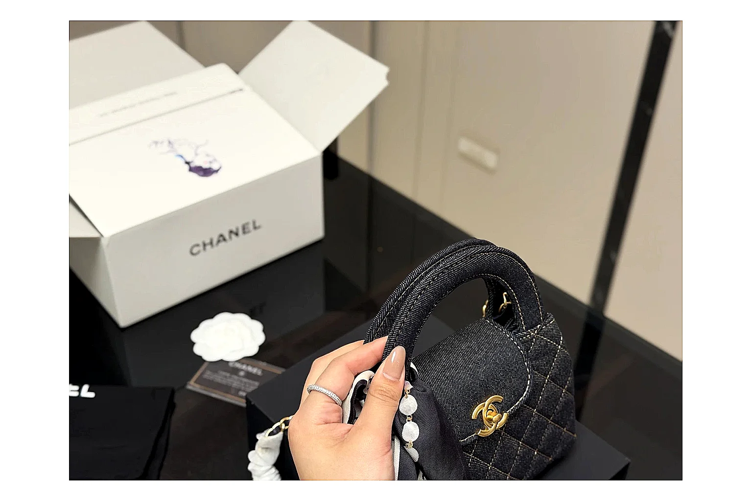 Chanel Quilted Chain Bag Black QC reference photo showing black quilted leather body, chain strap, flap profile, and polished luxury hardware thumbnail 6