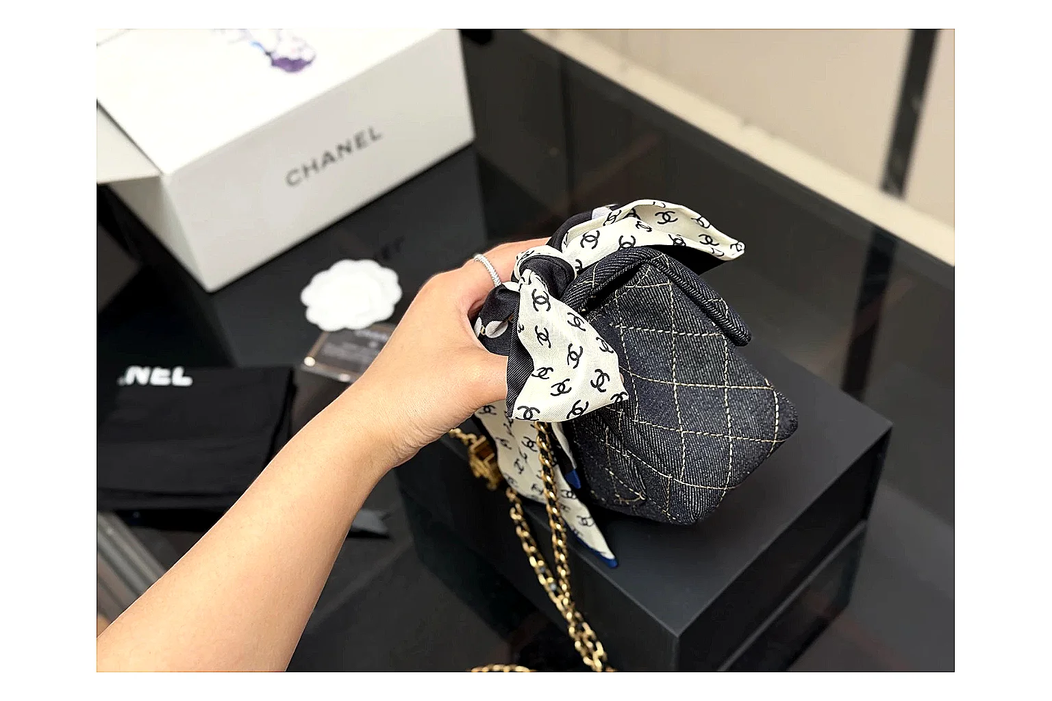 Chanel Quilted Chain Bag Black QC reference photo showing black quilted leather body, chain shoulder strap, flap structure, and polished hardware thumbnail 2
