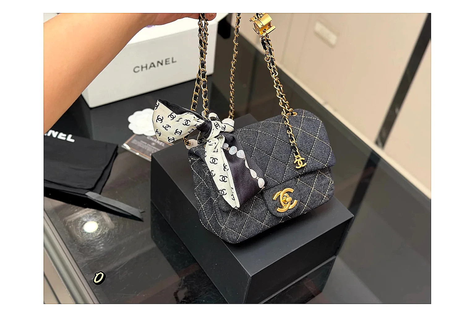 Chanel Quilted Chain Bag Black QC reference photo showing black quilted leather body, chain shoulder strap, flap structure, and polished hardware thumbnail 5