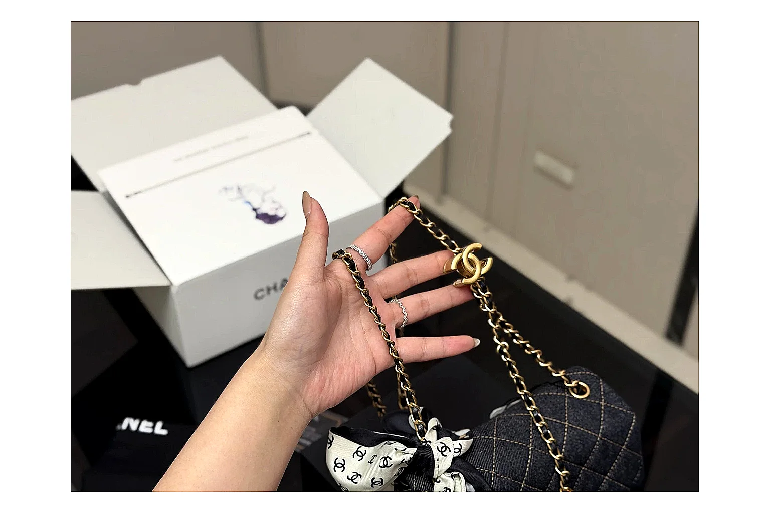 Chanel Quilted Chain Bag Black QC reference photo showing black quilted leather body, chain shoulder strap, flap structure, and polished hardware thumbnail 6