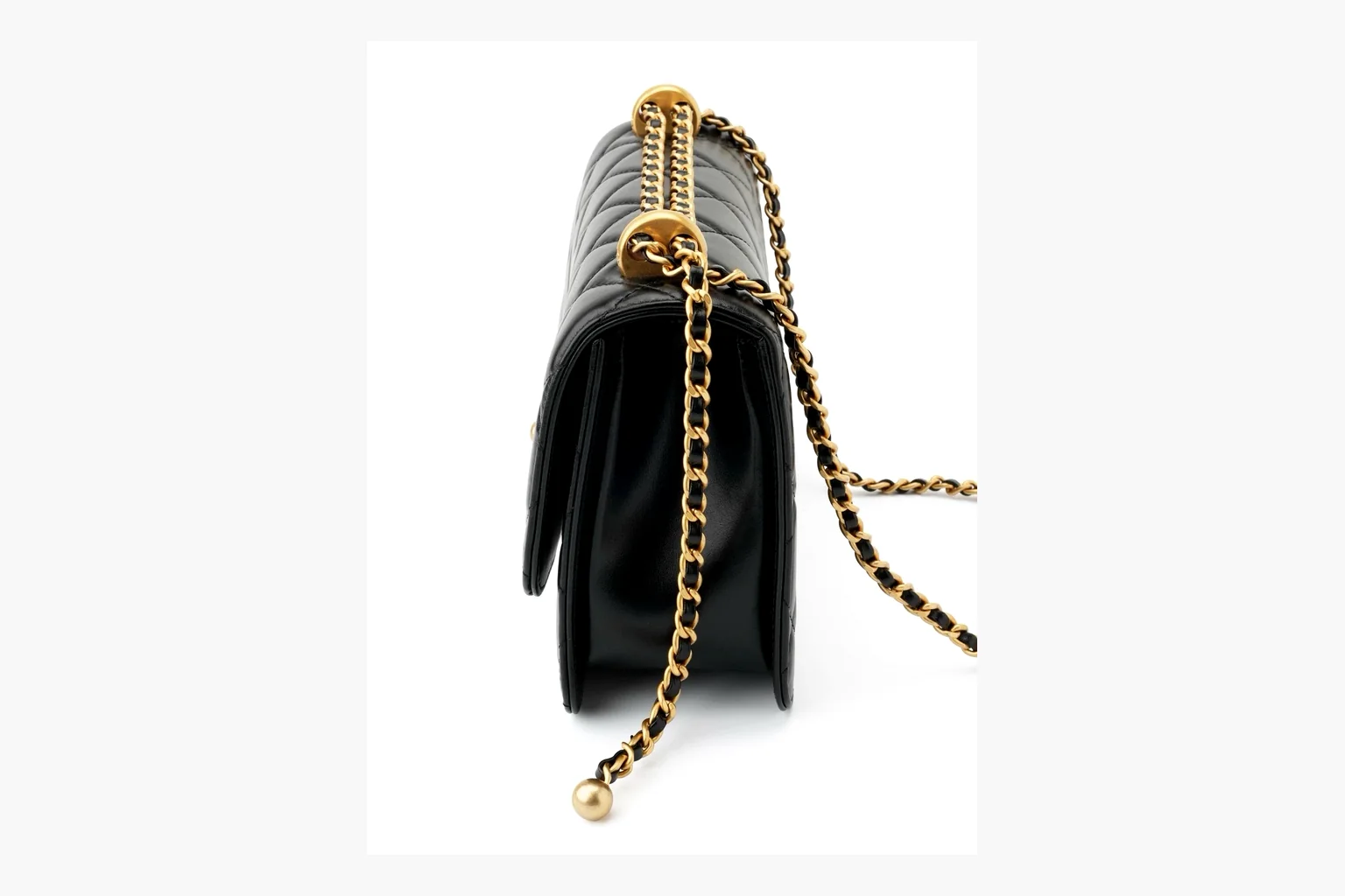 Chanel Black Quilted Chain Flap Bag QC reference photo showing black quilted leather flap body, gold chain strap, CC front logo, rectangular shoulder-bag shape, and polished hardware