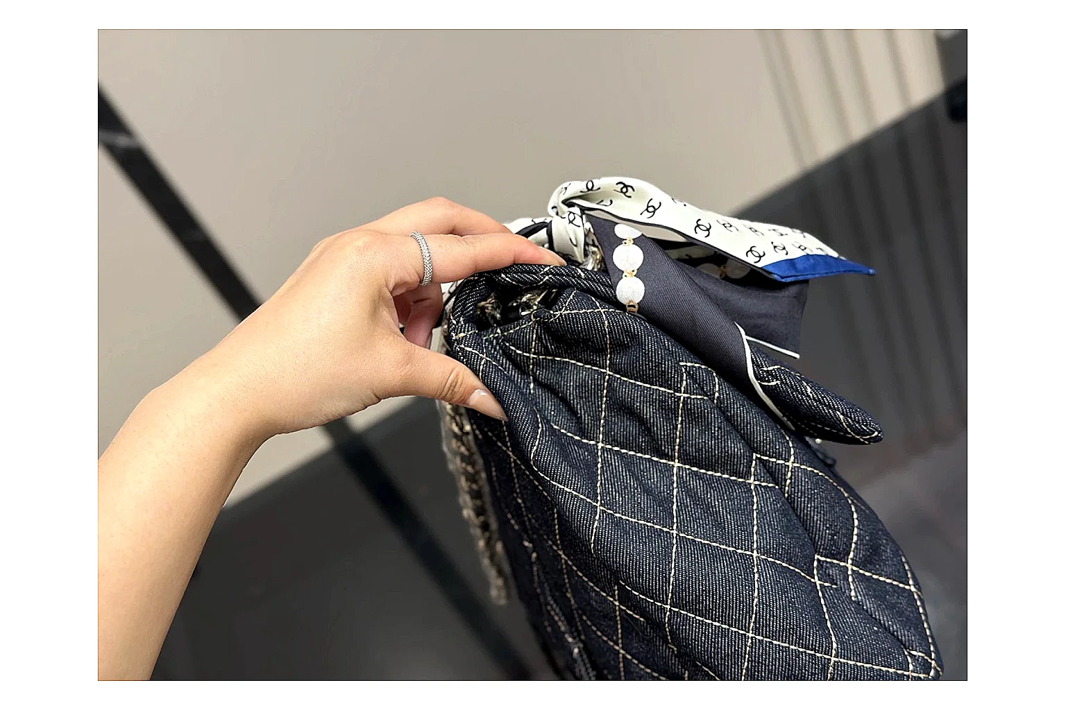 Chanel Quilted Flap Bag Black Denim QC reference photo showing black denim-look quilted flap body, shoulder-bag shape, chain strap, and polished hardware